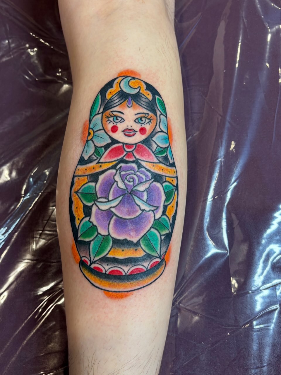 Matryoshka doll American traditional tattoo on the forearm by @rayscott_tattoo