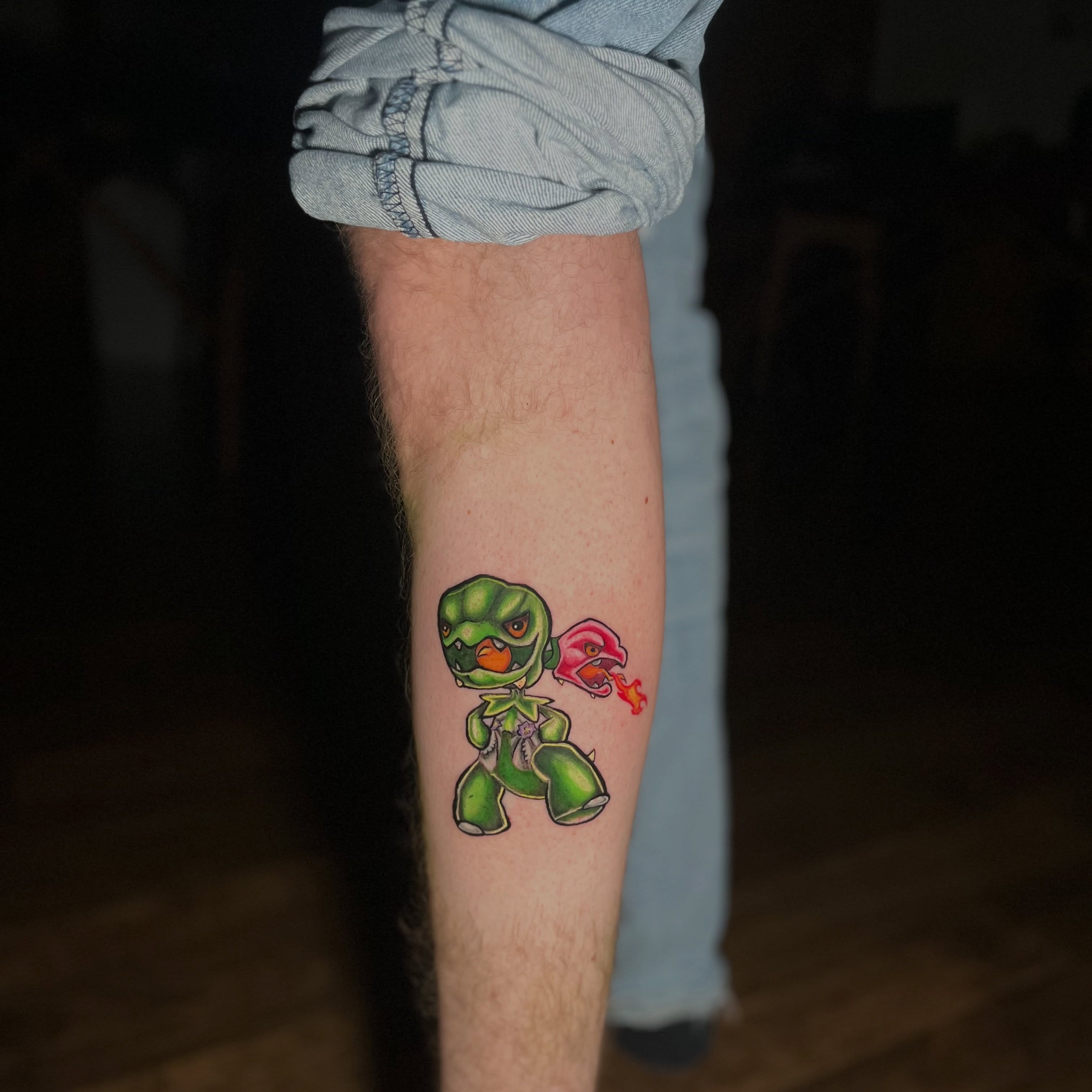 Green alien dotwork tattoo on the forearm by Kevin Tron