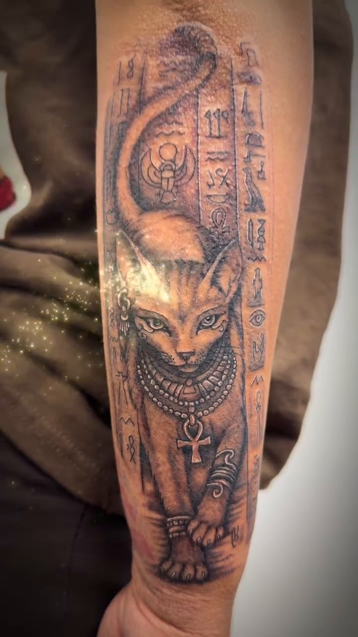 Egyptian cat goddess realism tattoo on the forearm by Tattoos by Dan Hatcher Carr, Parma, Ohio