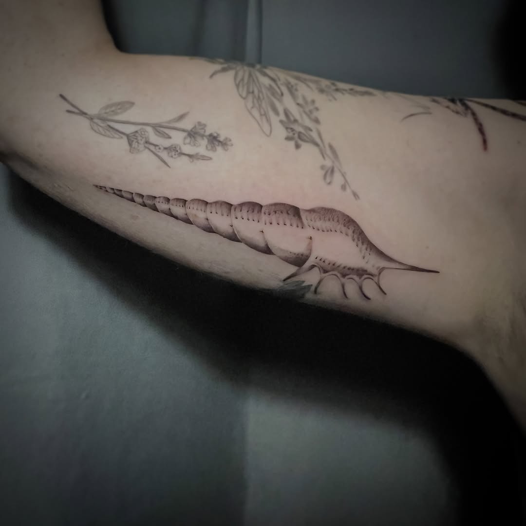 Tattoo by @southpaw.stipple — black_and_grey, realism