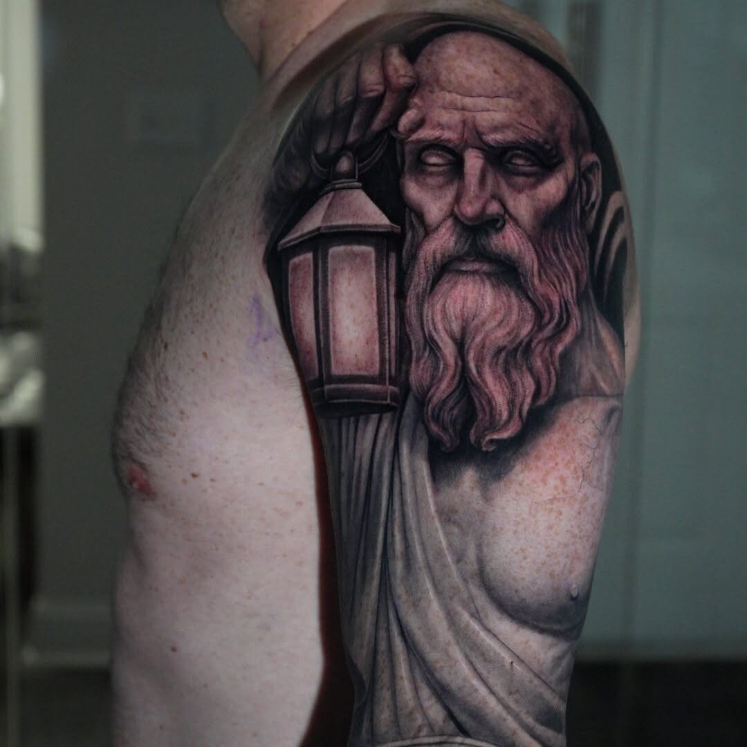 Tattoo by @tattsbyethan_ — realism, black_and_grey