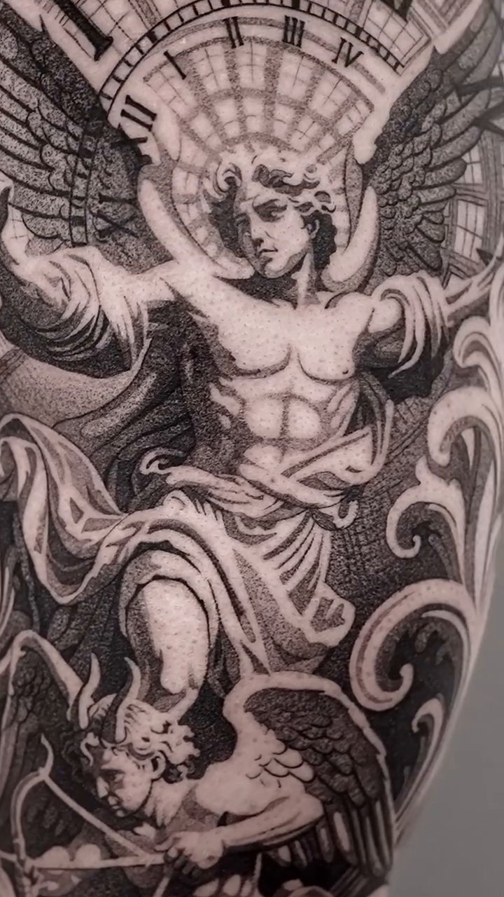 Angel with clock and cherubs realism tattoo on the upper arm by sacramento tattoo CA