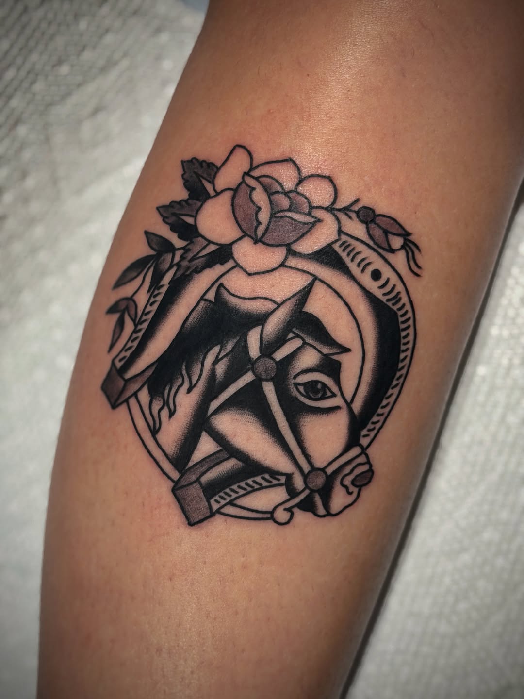 Tattoo by @under_handed — american_traditional, black_and_grey