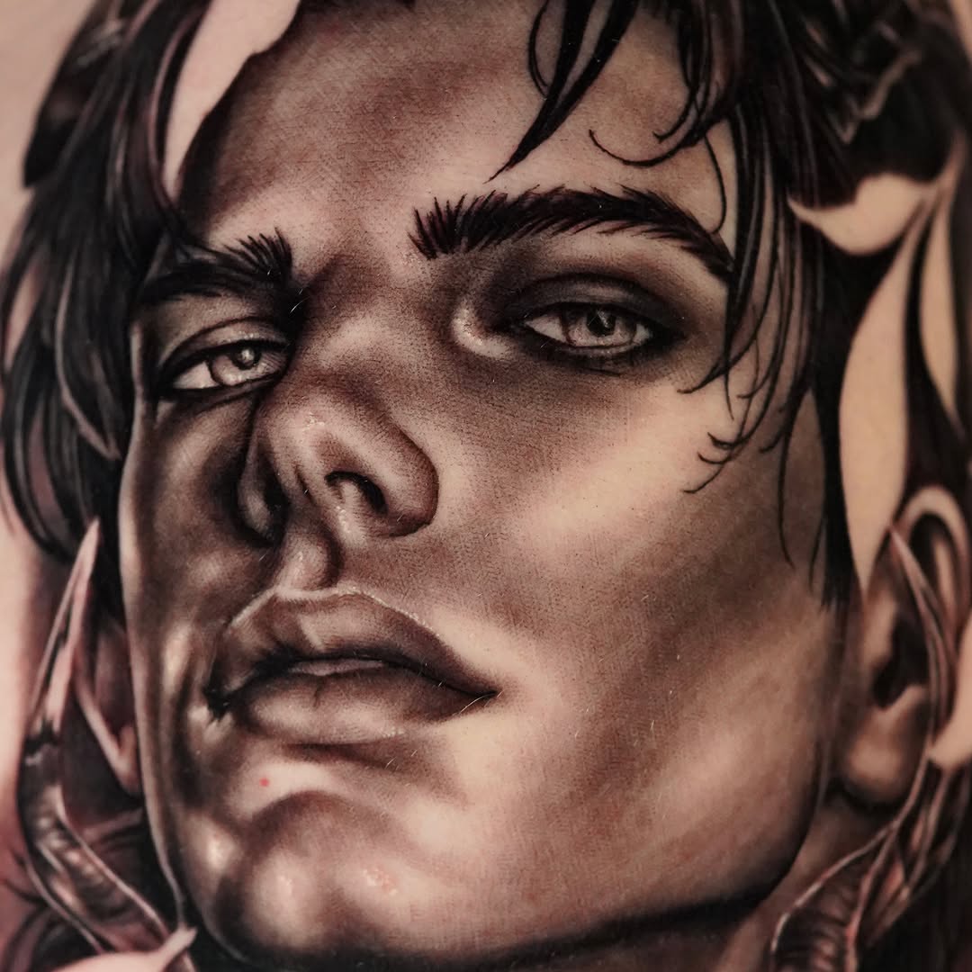Portrait of a man realism tattoo on the head by April Lynn