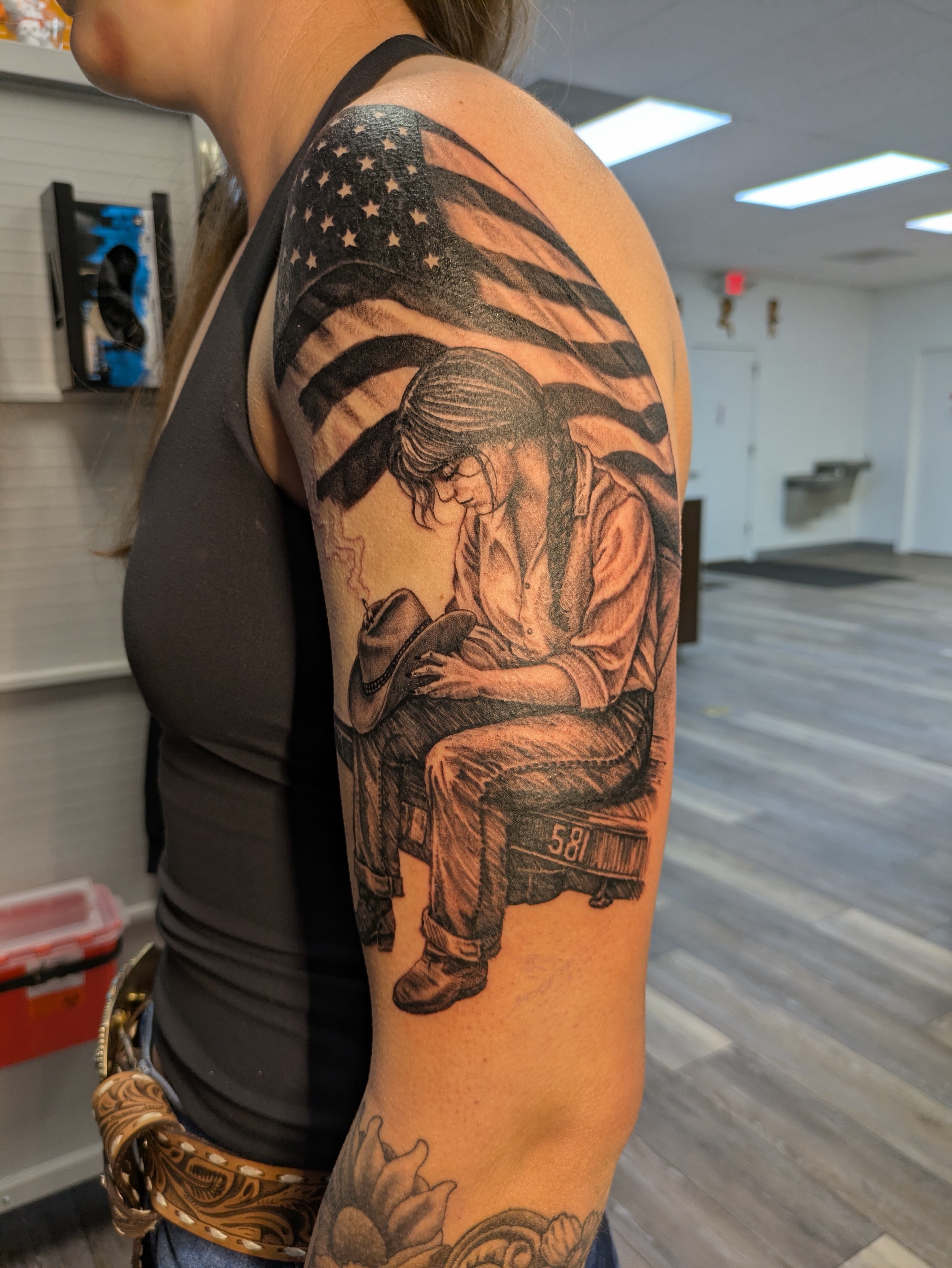 Prison inmate realism tattoo on the forearm by Buddy K.