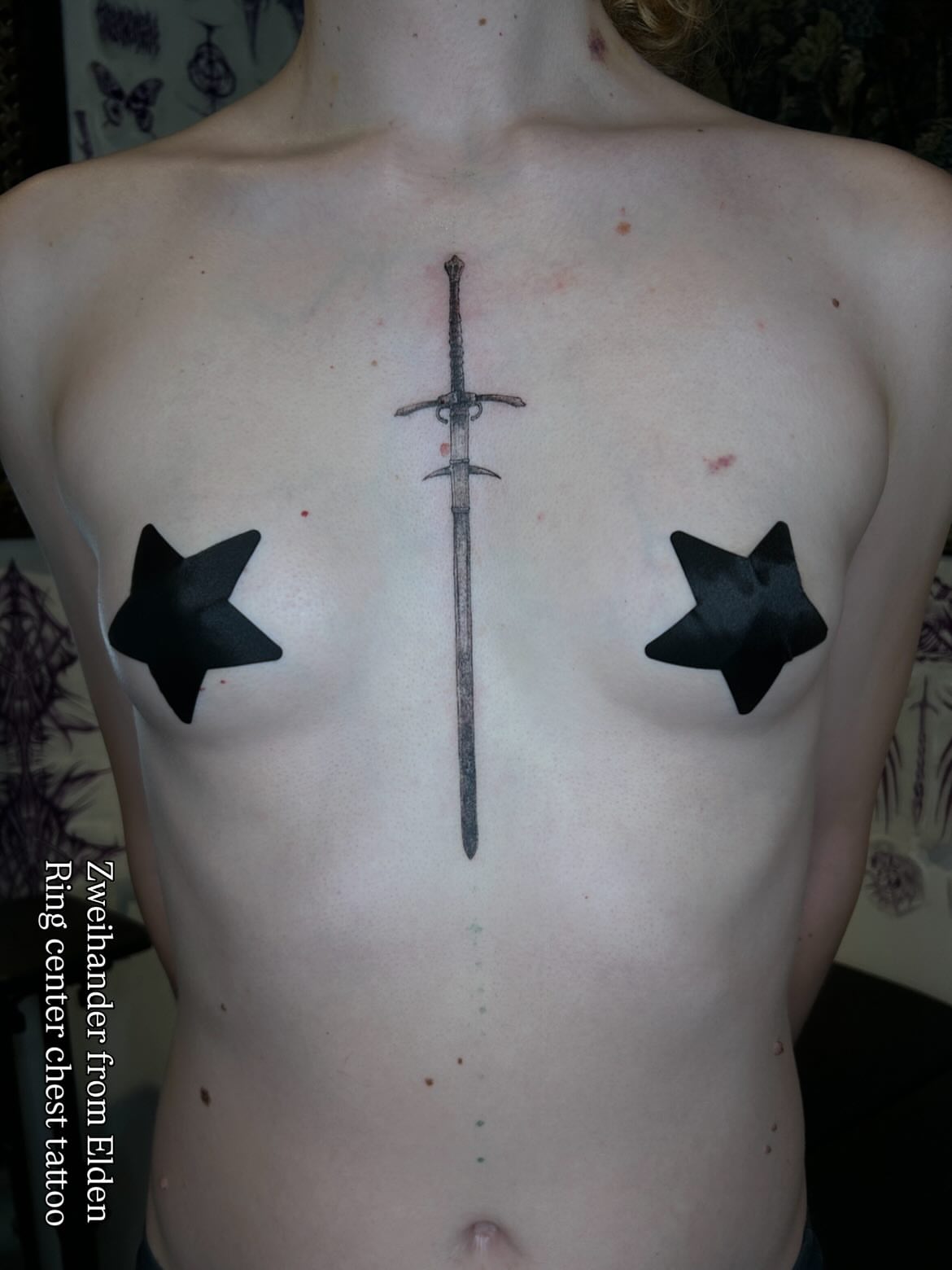 Two-handed sword black and grey tattoo on the chest by ๐๐ฆ๐ฐ๐ฆ๐