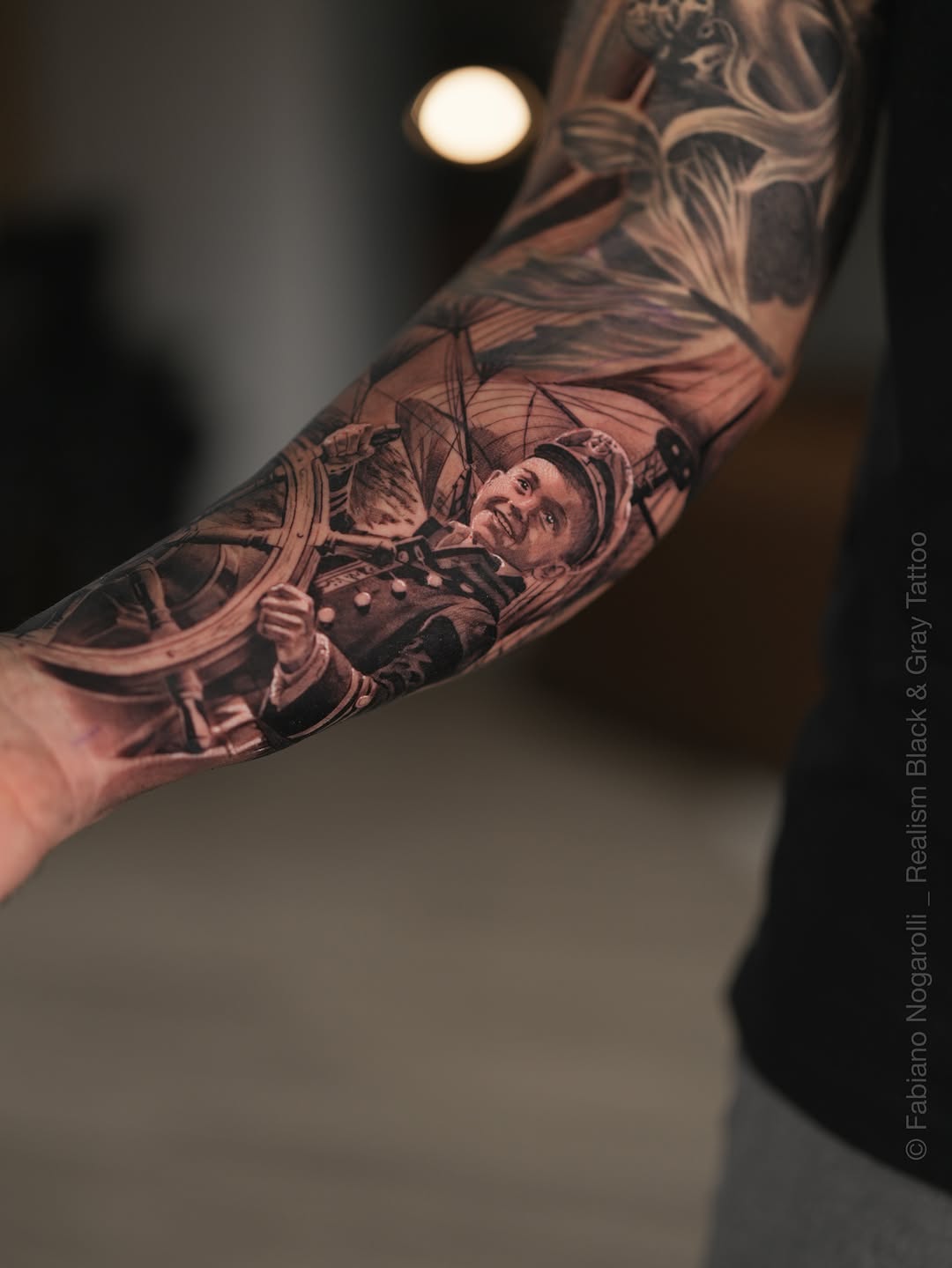 Tattoo by @nogarolli_tattoo — realism, black_and_grey