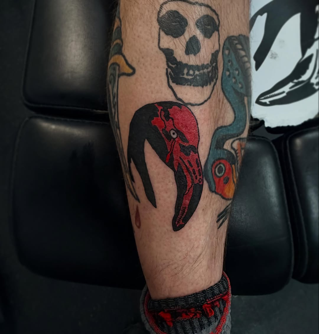 Flamingo skull and dagger realism tattoo on the forearm by Rylan Thorndyke - Tattoo Artist, Las Vegas, Nevada