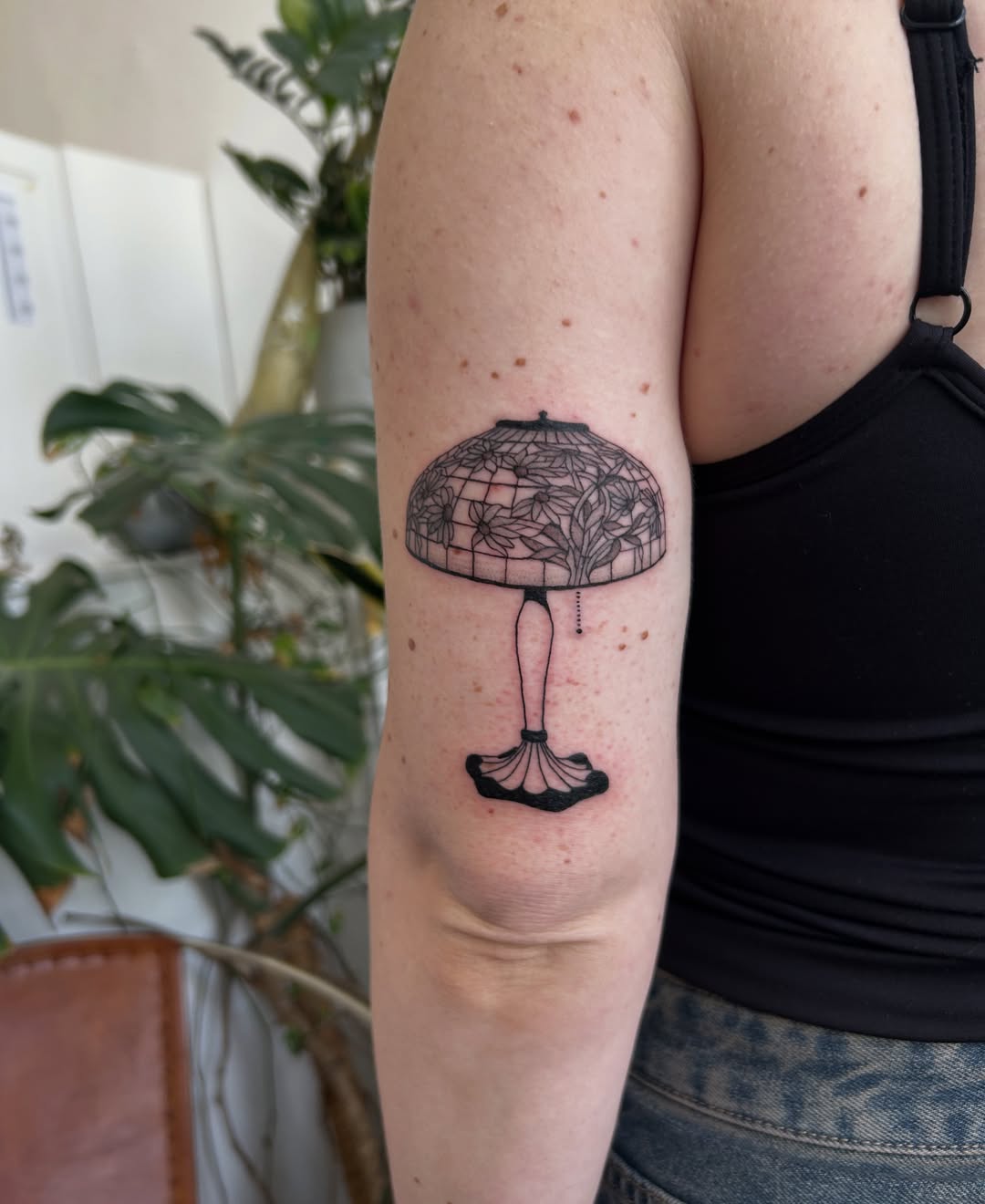 Lampshade black and grey tattoo on the forearm by beth