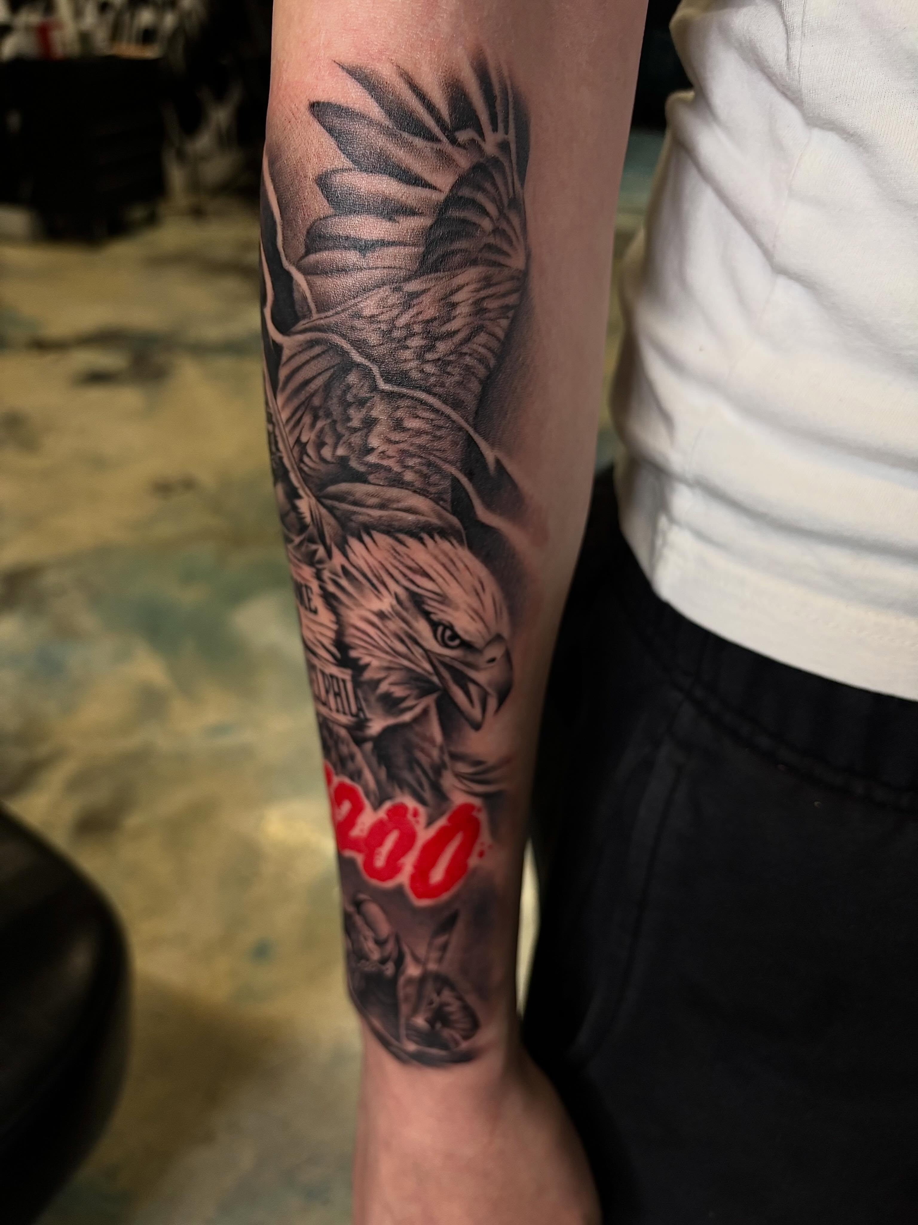 Eagle realism tattoo on the forearm by Jay Daartist