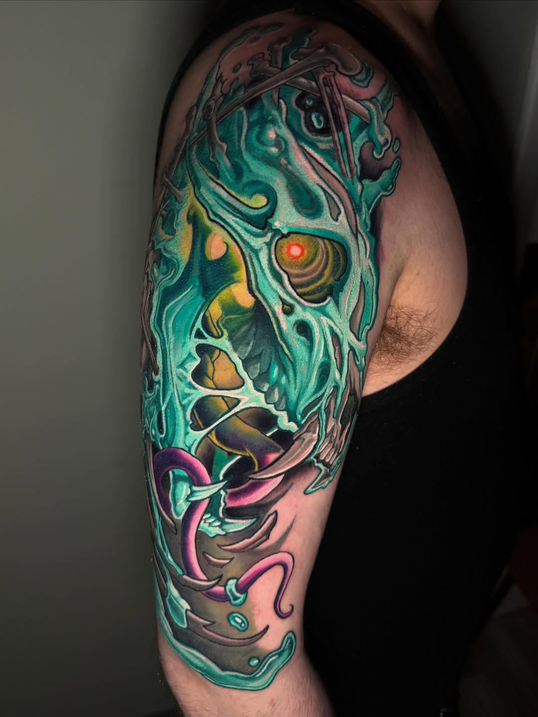 Biomechanical skull with tentacles biomech tattoo on the forearm by Zoe "Z" Fisk