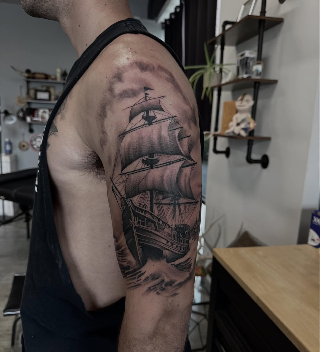 Tattoo by @_aaroncarey — realism, black_and_grey
