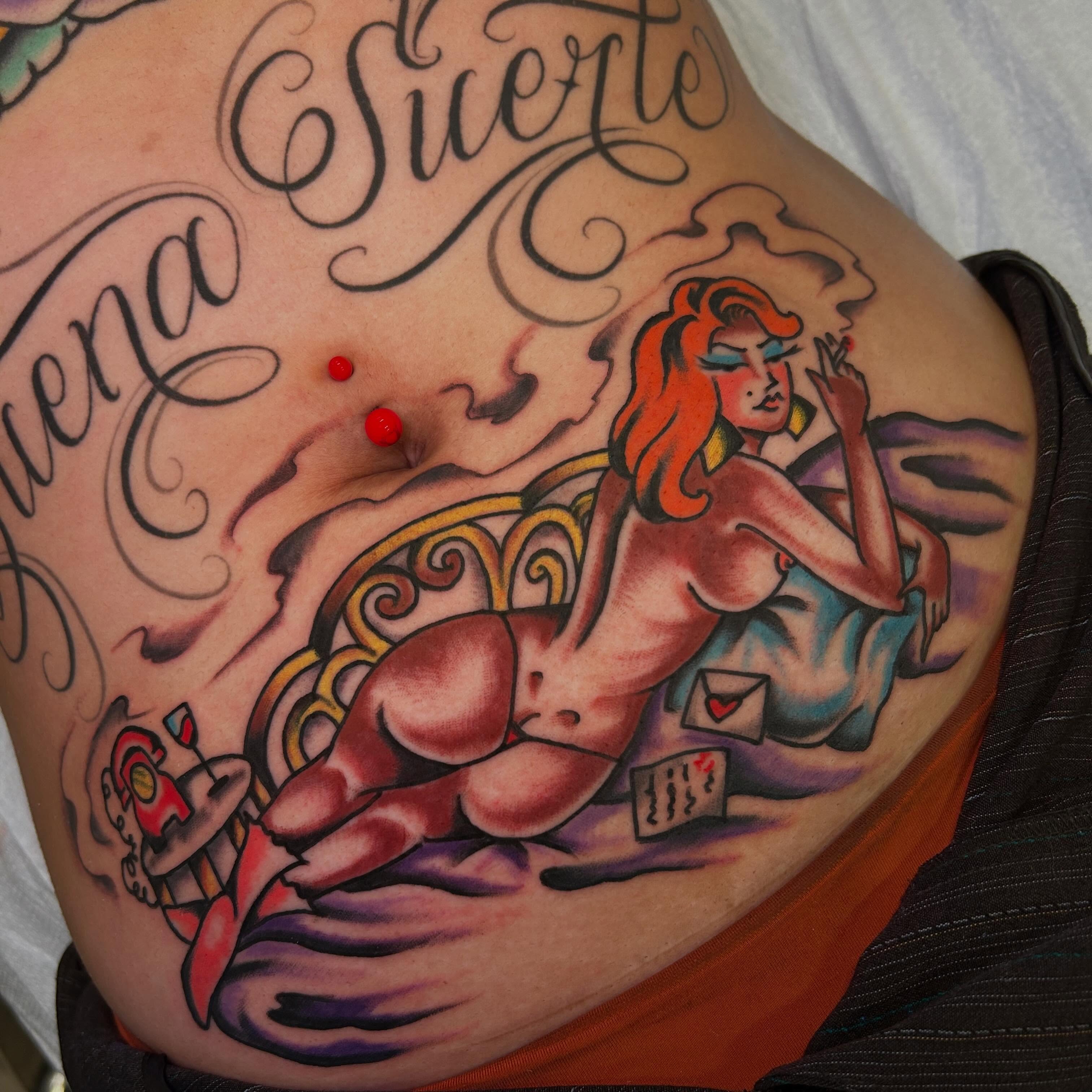 Pin-up girl American traditional tattoo by Sanjuanita