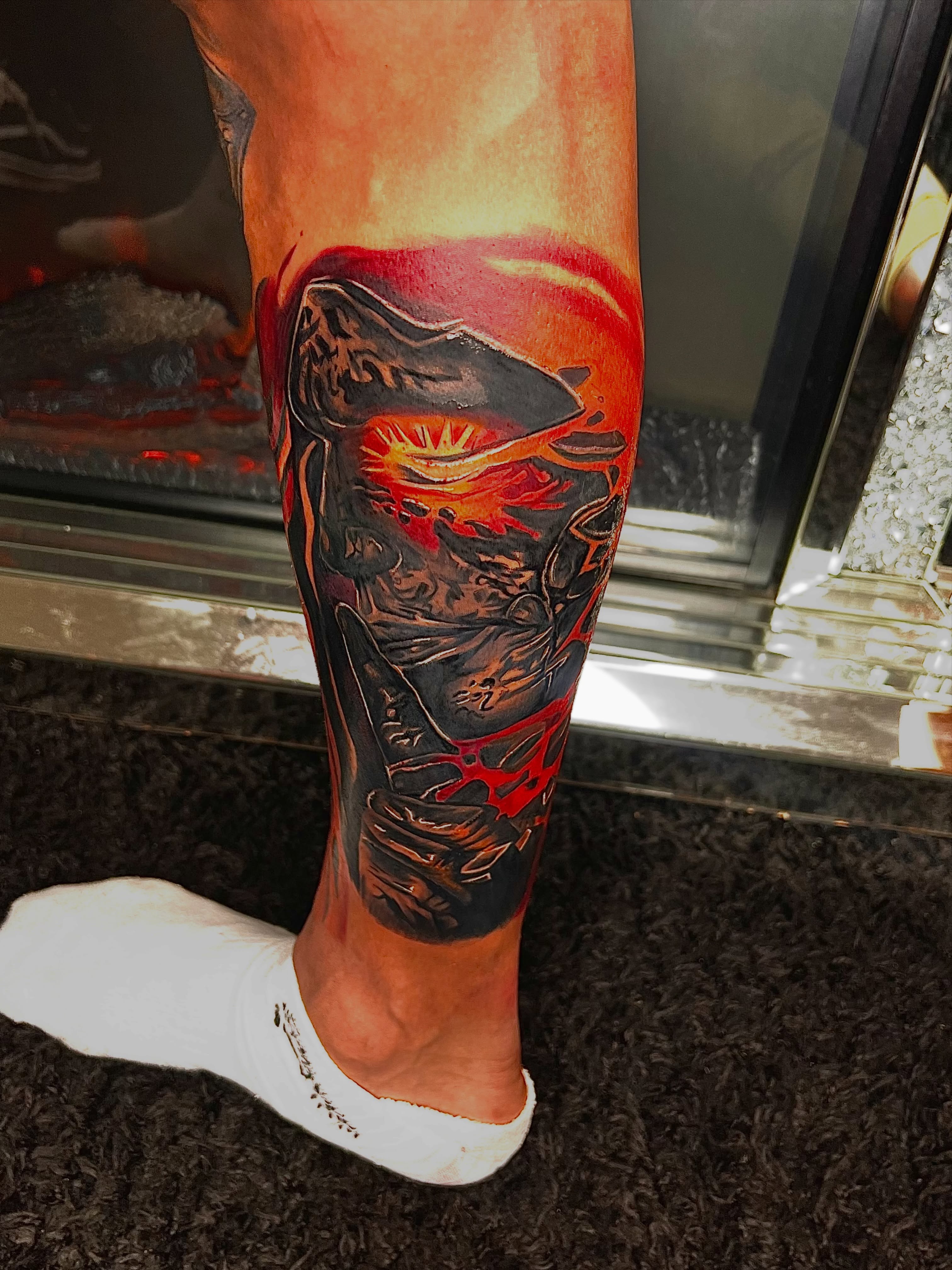 Cyborg dark realism tattoo on the calf by Deonte Dwayne Durham
