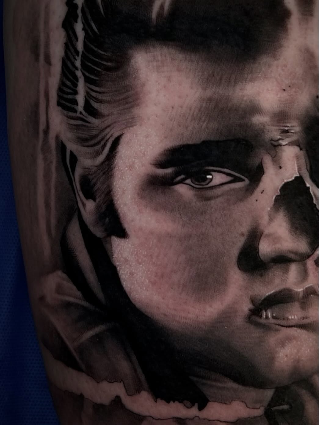 Portrait of a man realism tattoo on the forearm by Dallas Corsmeier