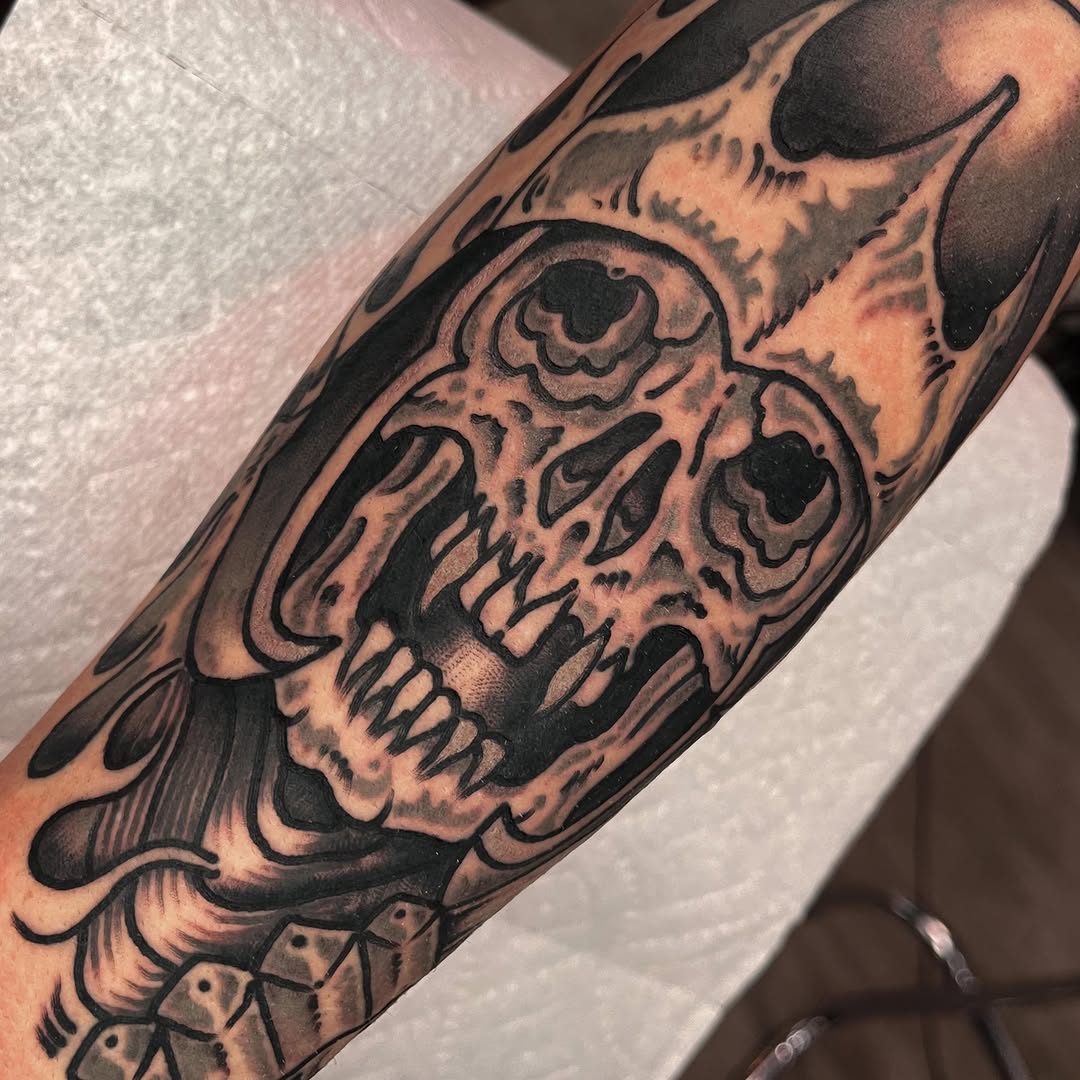 Tattoo by @slygibson — black_and_grey, dark_realism