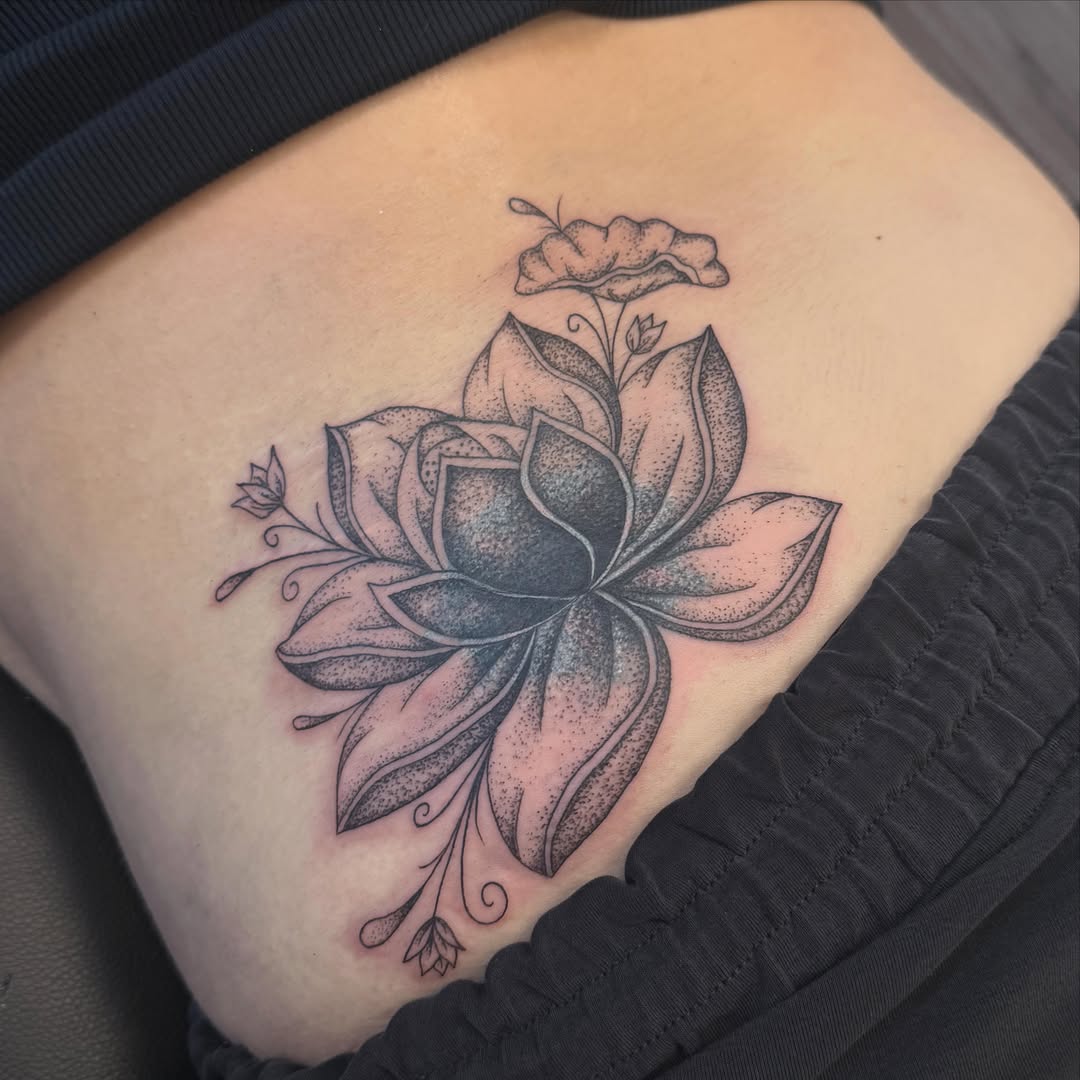 Lotus flower dotwork tattoo on the thigh by ✨olivia