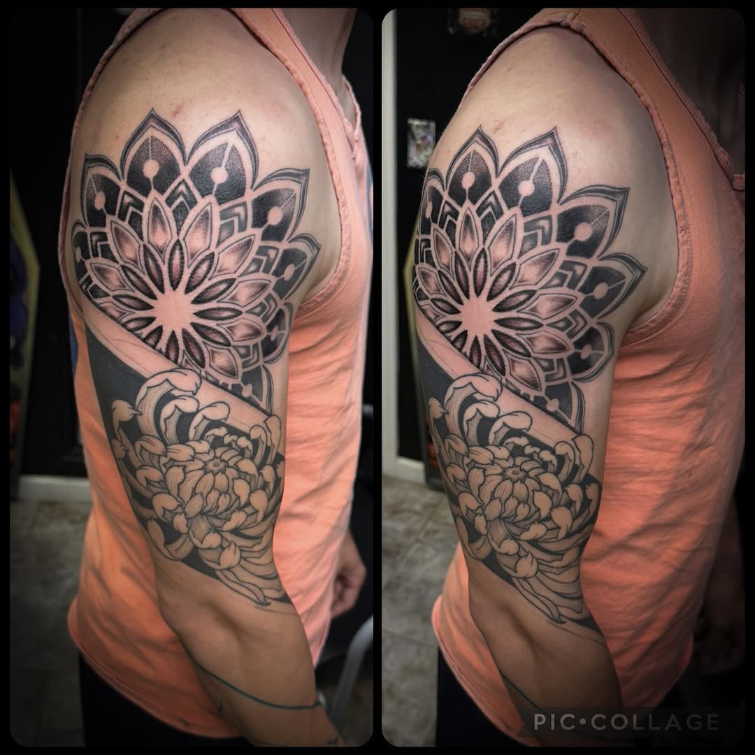 Mandala and chrysanthemum geometric tattoo on the upper arm by 𝔻𝕖𝕣𝕣𝕚𝕔𝕜 𝔹𝕦𝕪𝕖𝕒, East Aurora, New York