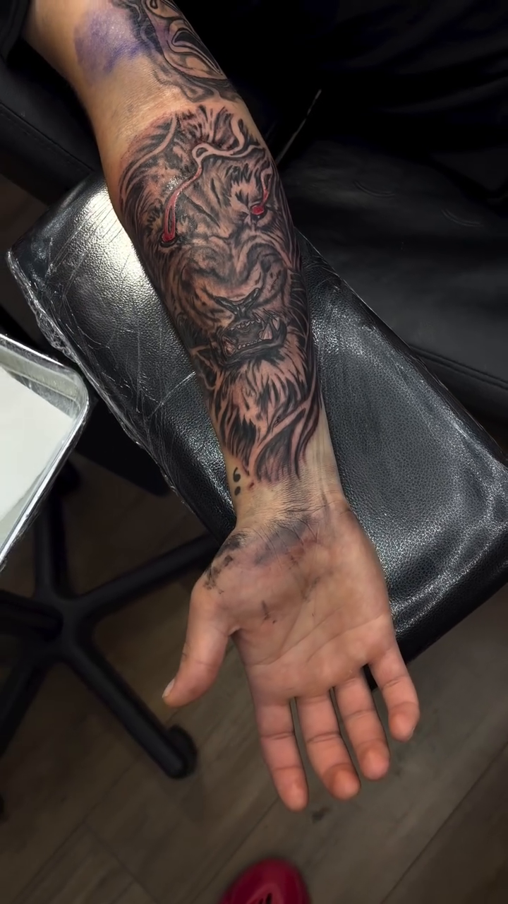 Lion head tattoo on forearm Japanese tattoo on the upper arm by Mike Tatts