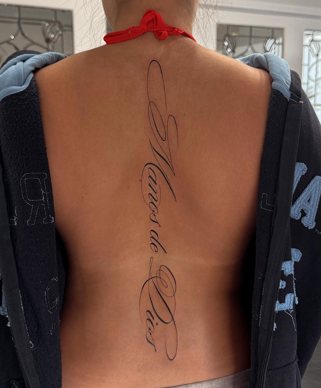 Script lettering lettering tattoo on the back by Jennifer Garcia R - Vegas tattoo artist