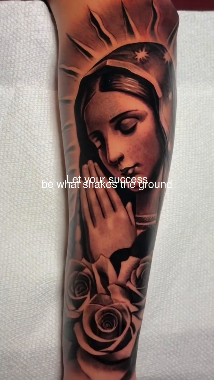 Praying Virgin Mary with roses Chicano tattoo on the forearm by Flames, Cerritos, California
