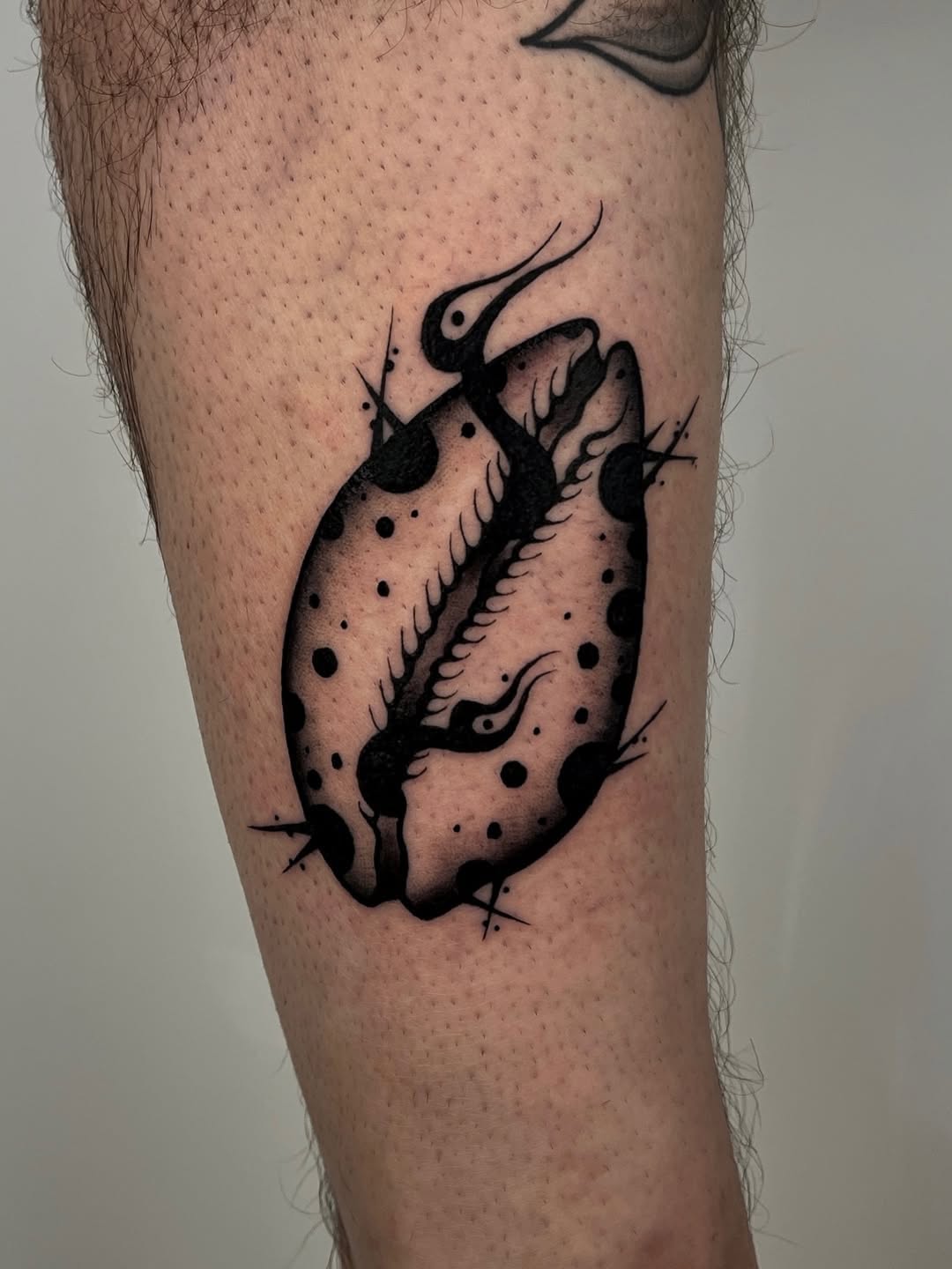 Tattoo by @rebel_milly — blackwork, dotwork