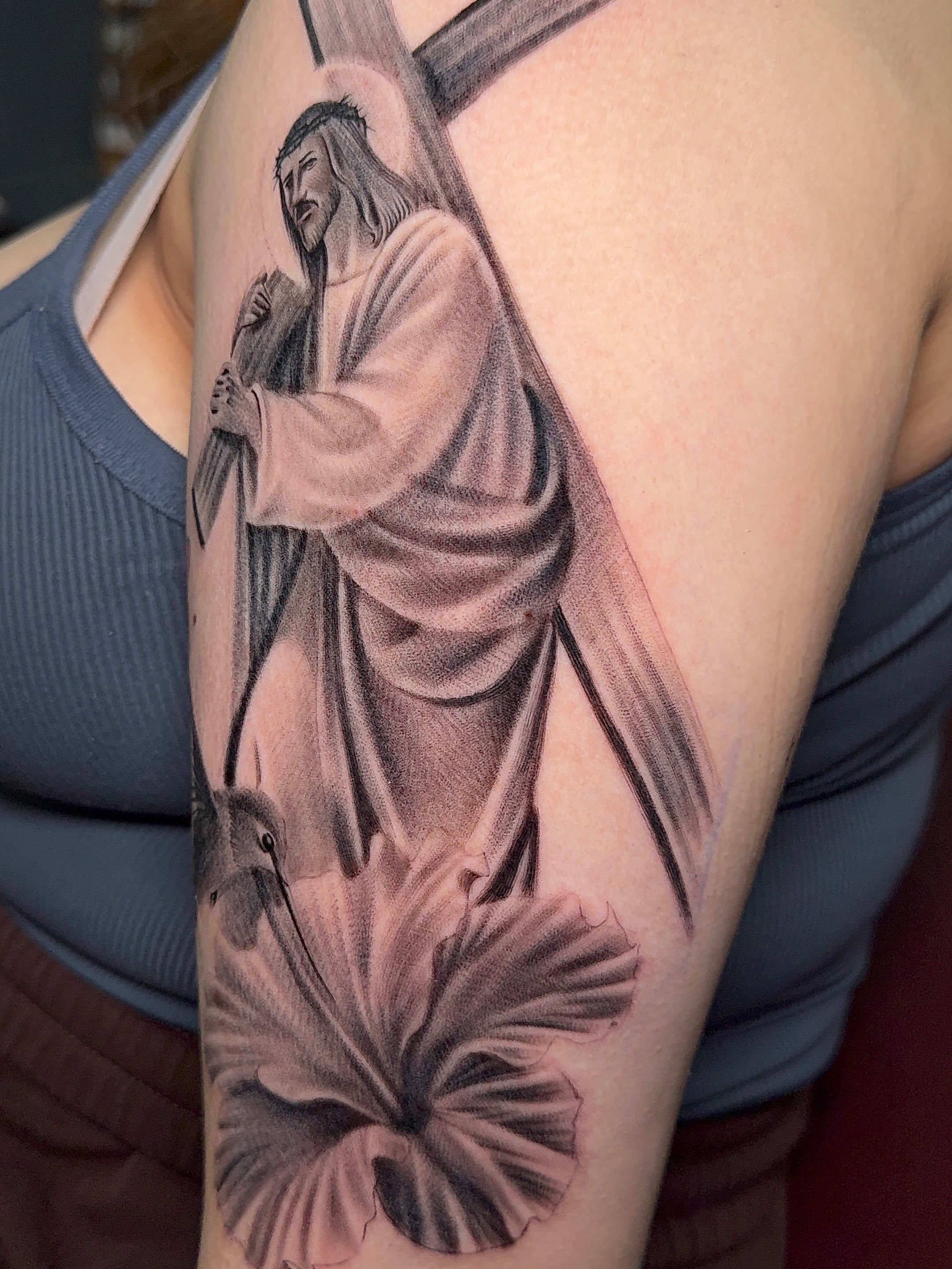 Jesus carrying cross realism tattoo on the forearm by Dallas tattoo artist, Dallas, Texas