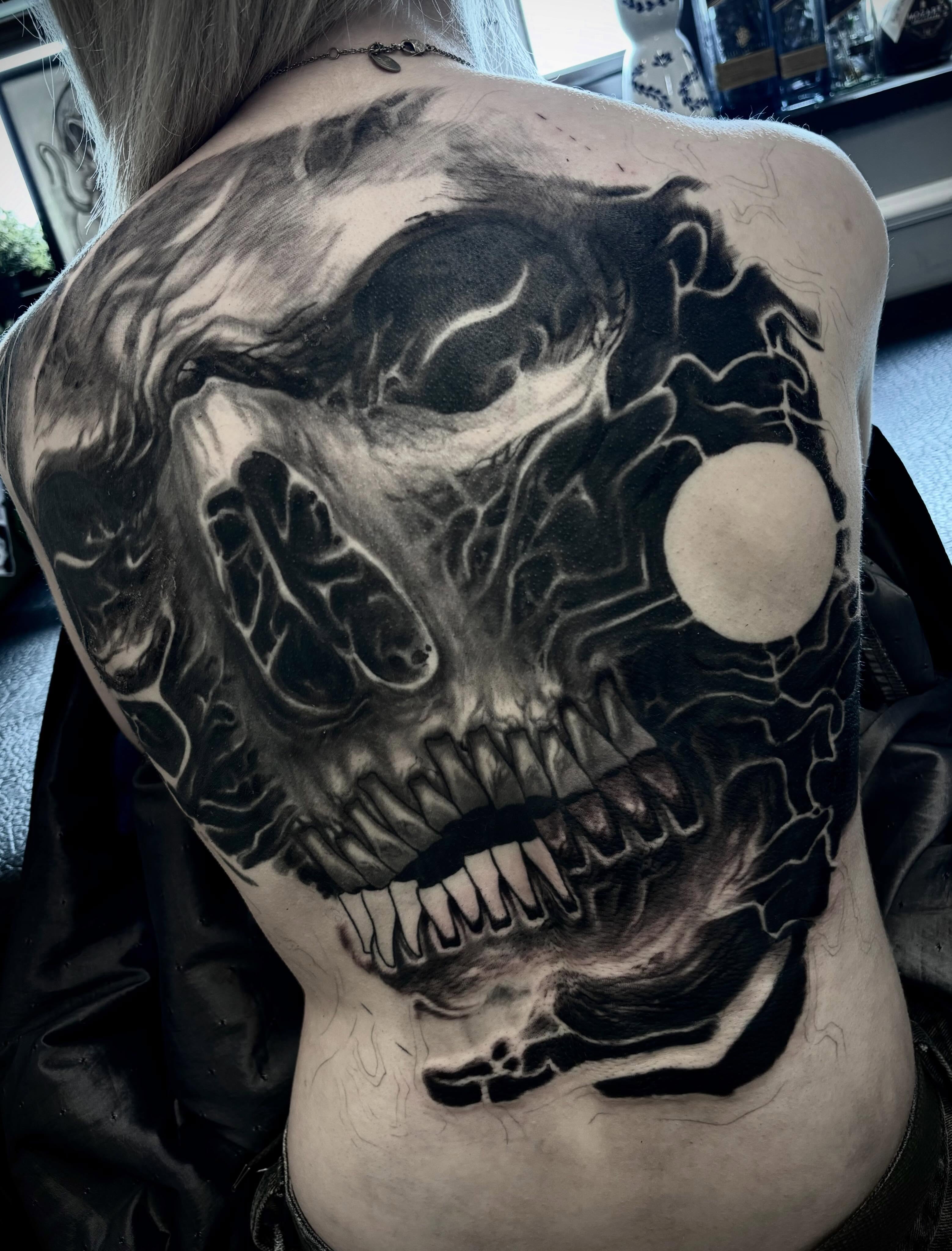 Tattoo by @blaggy__black — black_and_grey, dark_realism