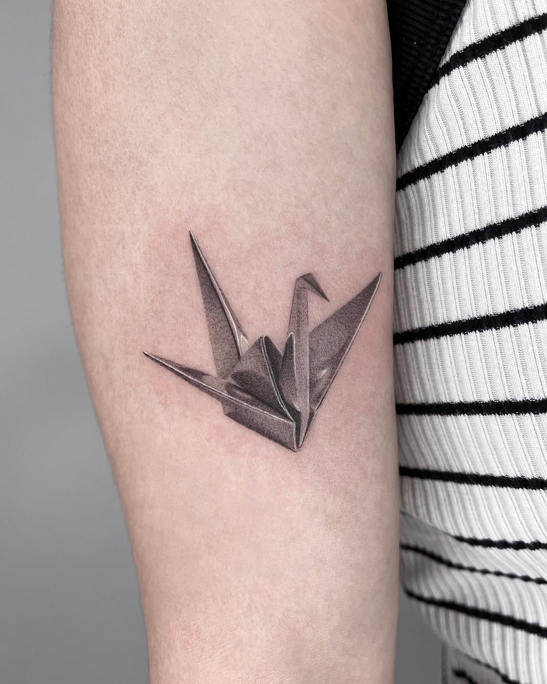 Tattoo by @nuku_tattoo — realism, black_and_grey