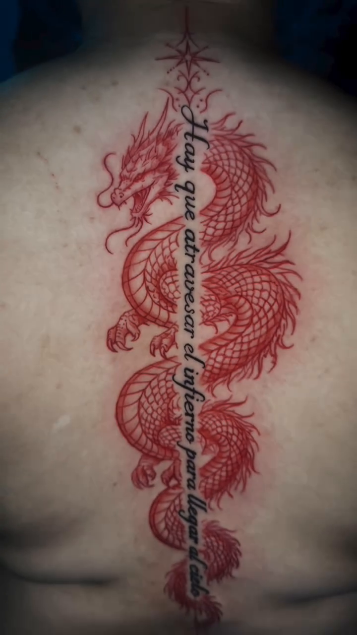 Watercolor tattoo on the back by InkedByJide Tattoo, Atlanta, Georgia
