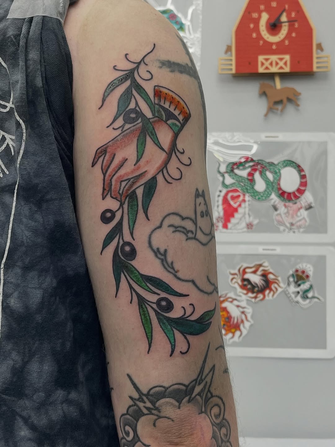 Hand with olive branch dotwork tattoo on the forearm by Sour Tattoo, Somerville, Massachusetts