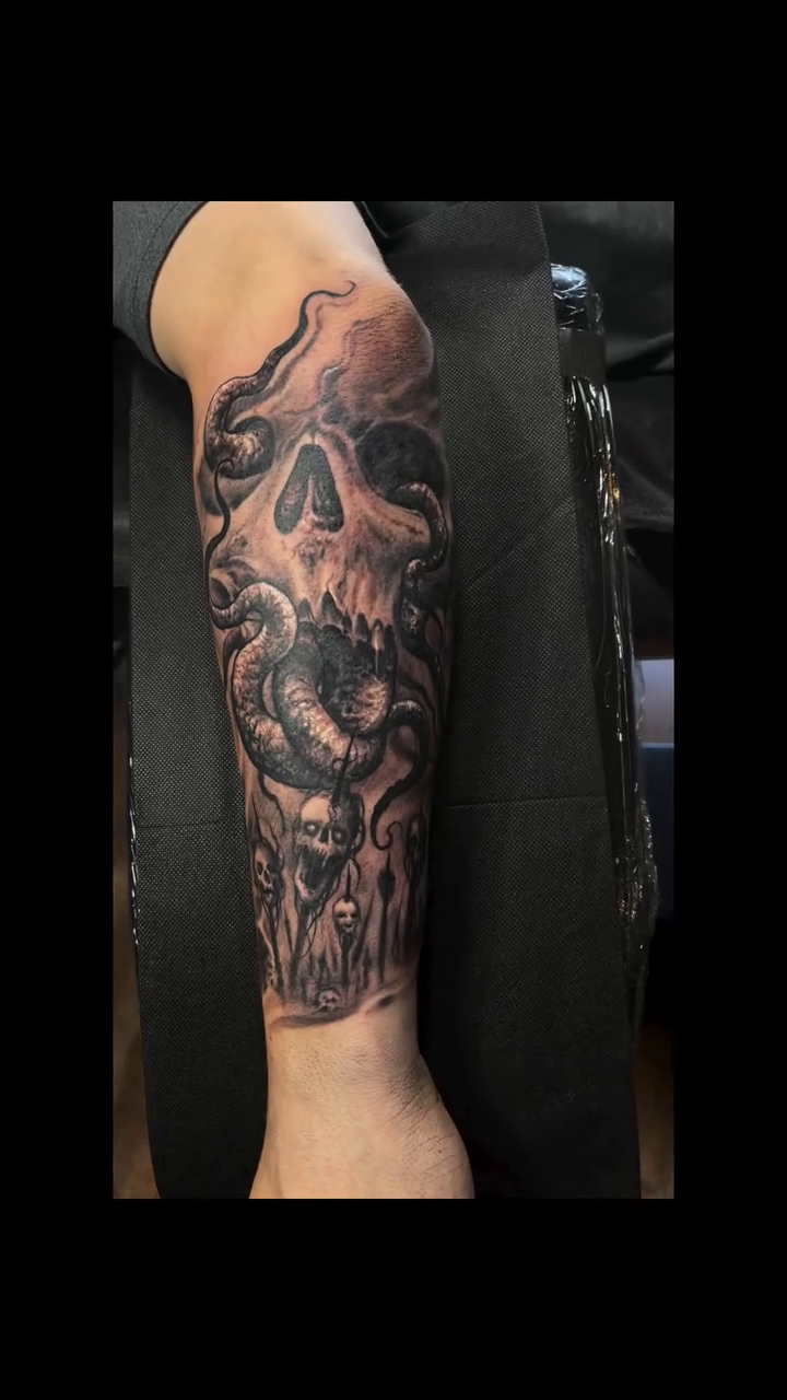 Skull and tentacles dark realism tattoo by Jason Oz, Denver, Colorado