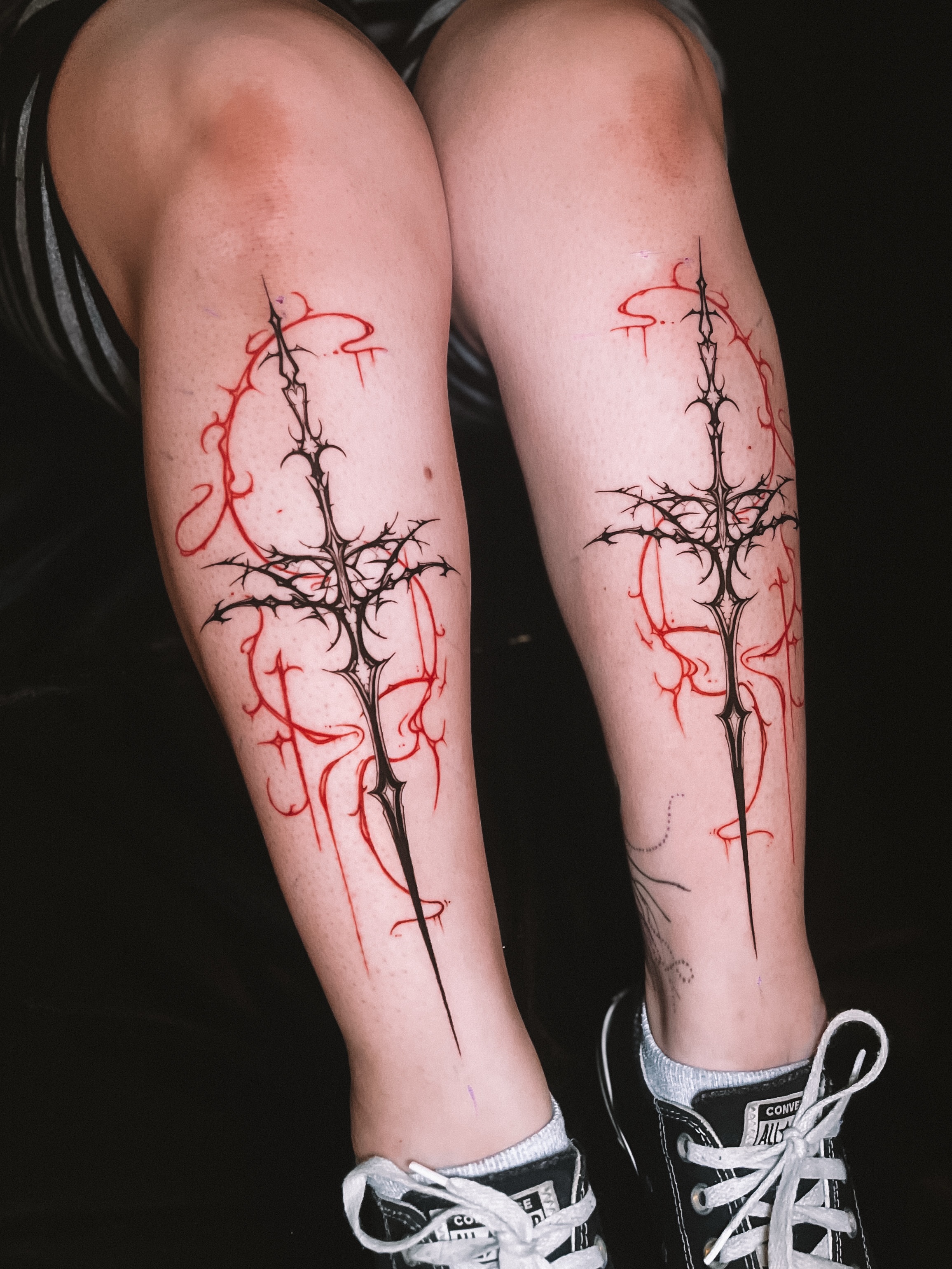 Thorn cross blackwork tattoo on the calf by sebs phạm, Los Angeles, California