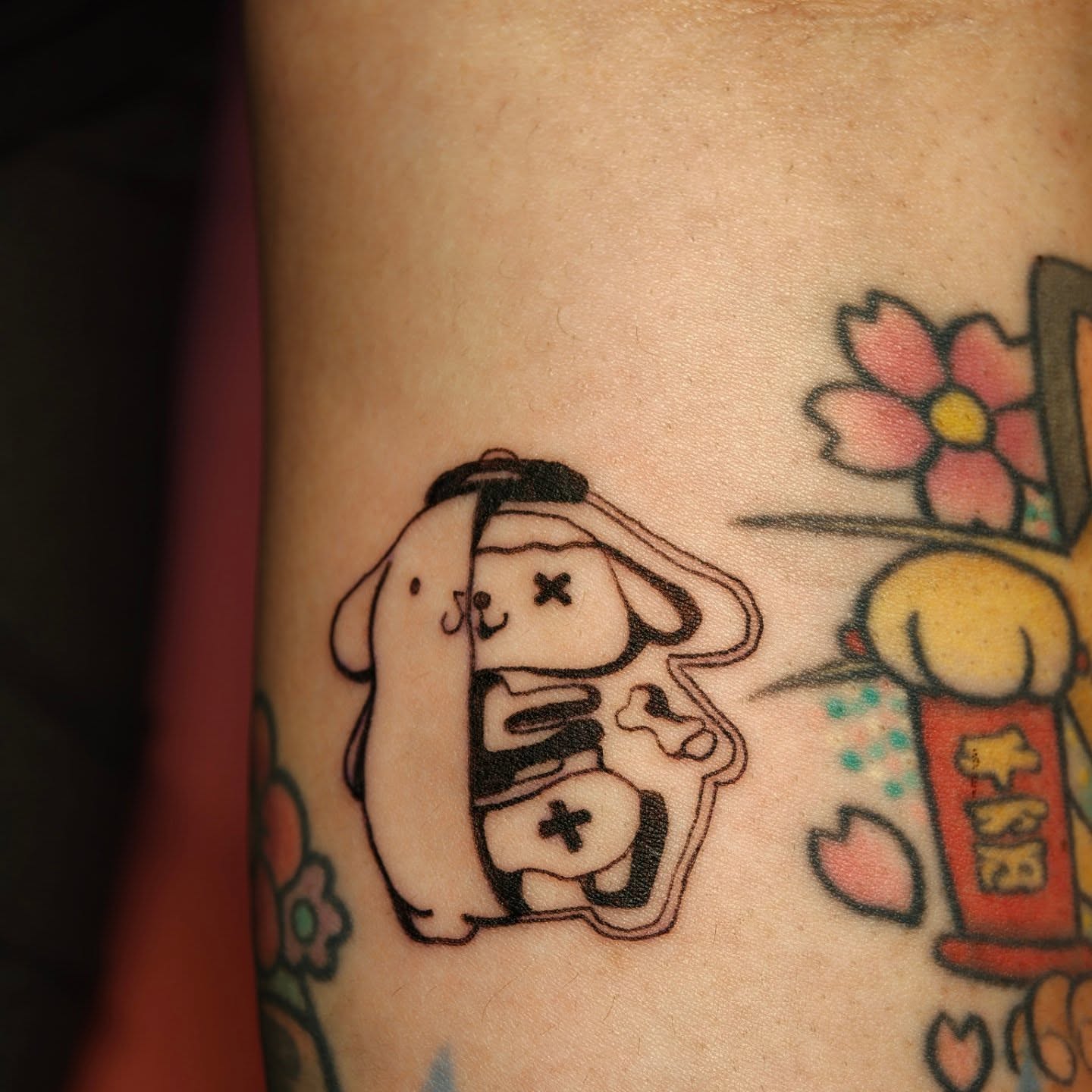 Kawaii characters anime tattoo on the forearm by Dani Sandoval, Anaheim, California