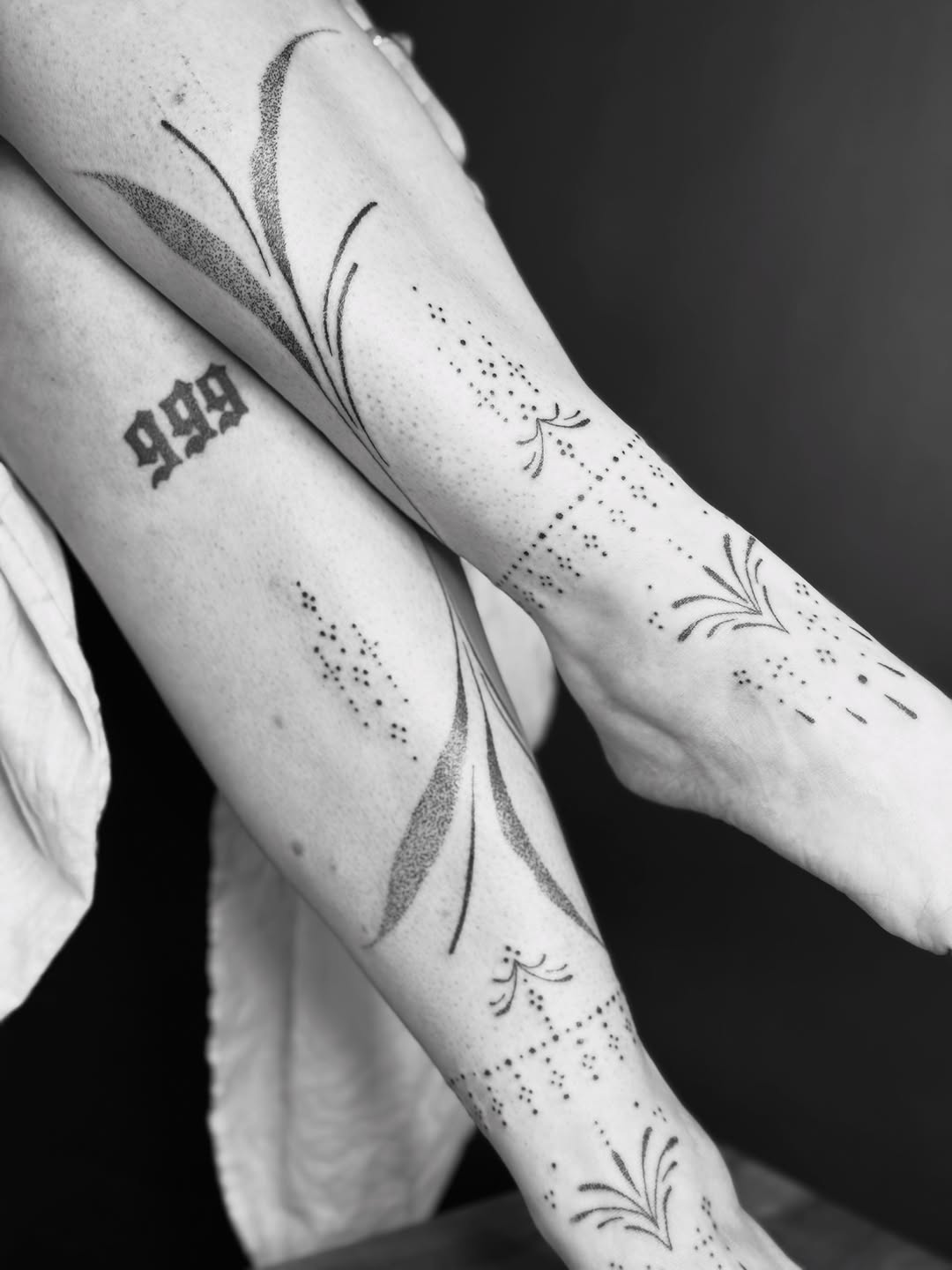 Botanical elements and numbers ornamental tattoo on the forearm by @ethereal.ornamentalism