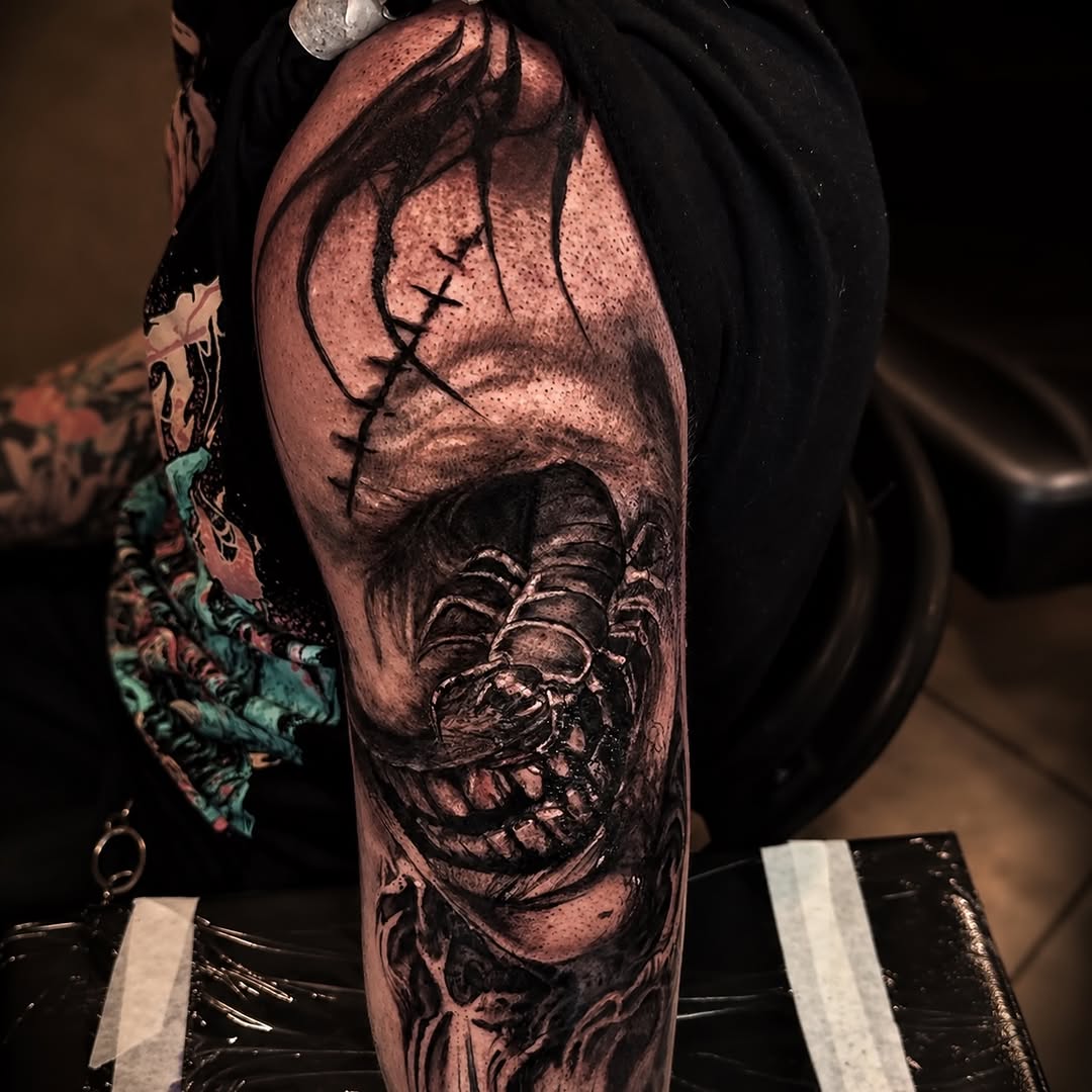 Scorpion in a hole realism tattoo on the forearm by C.J. Rued
