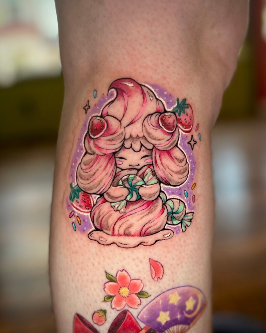 Kawaii character new school tattoo on the forearm by Alex