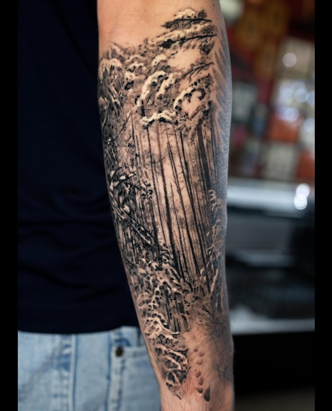 Winter forest scene dark art tattoo on the forearm by Realistic tattoos in Minneapolis, MN, Minneapolis, Minnesota