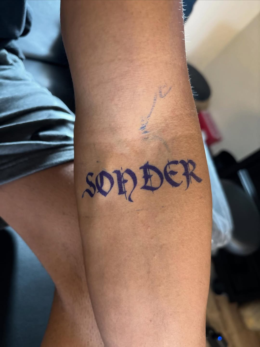 SONDER lettering tattoo on the forearm by Pres!