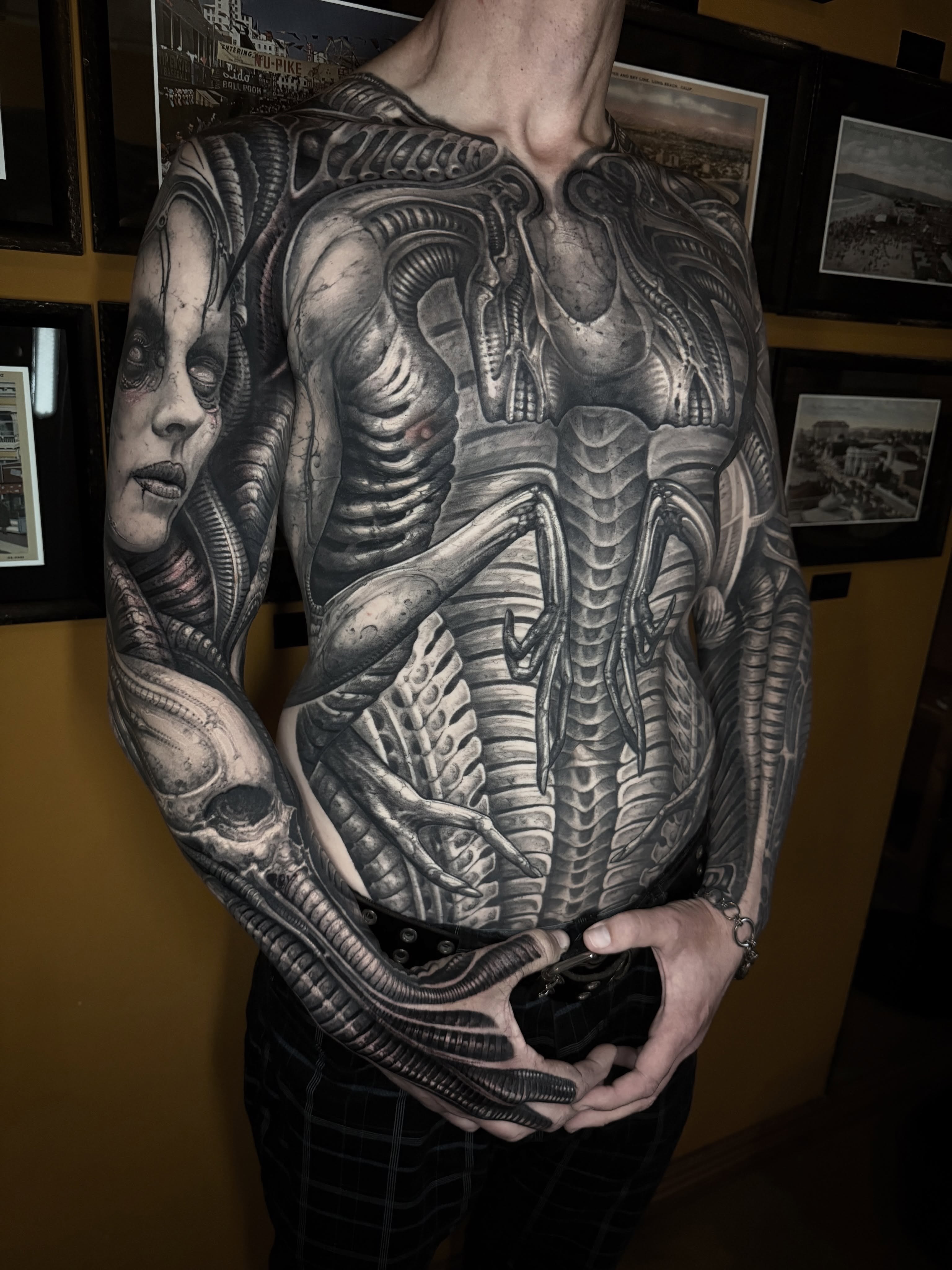 Alien creature realism tattoo on the chest by Jeremiah Barba