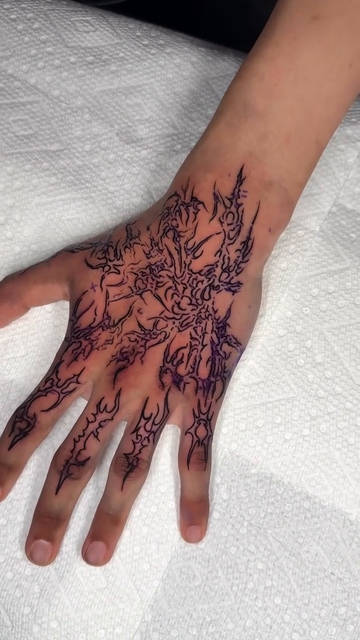 Ornamental hand tattoo cyber sigilism tattoo on the hand by Seattle Cybersigilism Tattoo Horror