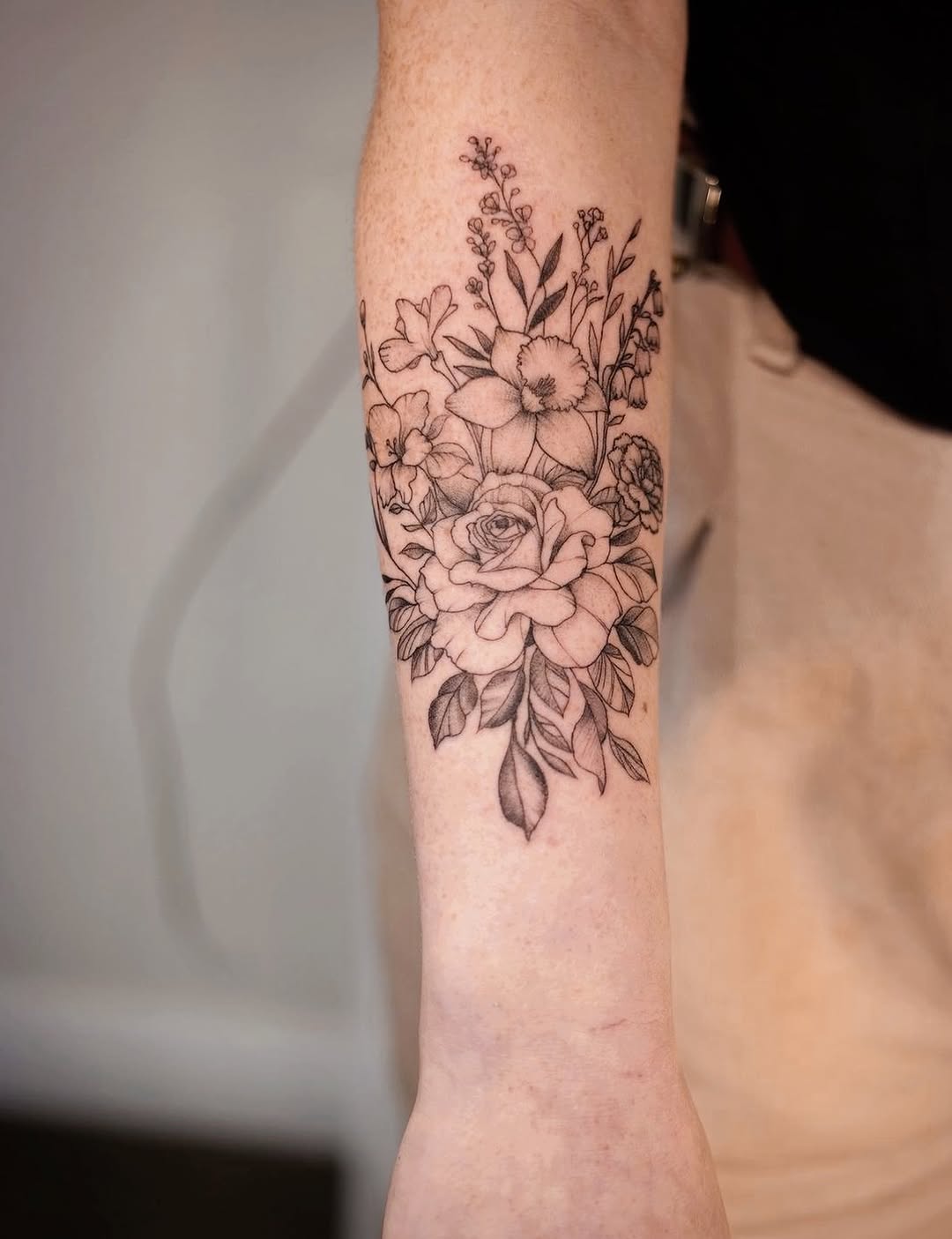Floral bouquet dotwork tattoo on the forearm by JAmy Winters