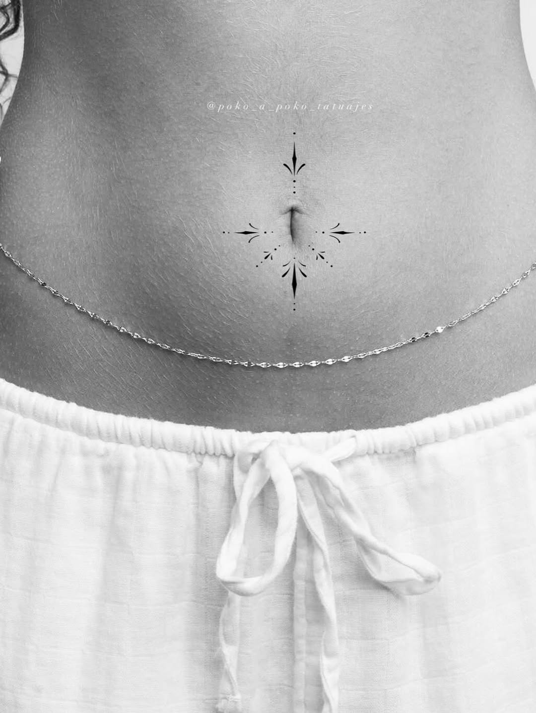 Geometric starburst tattoo on the torso by @ethereal.ornamentalism