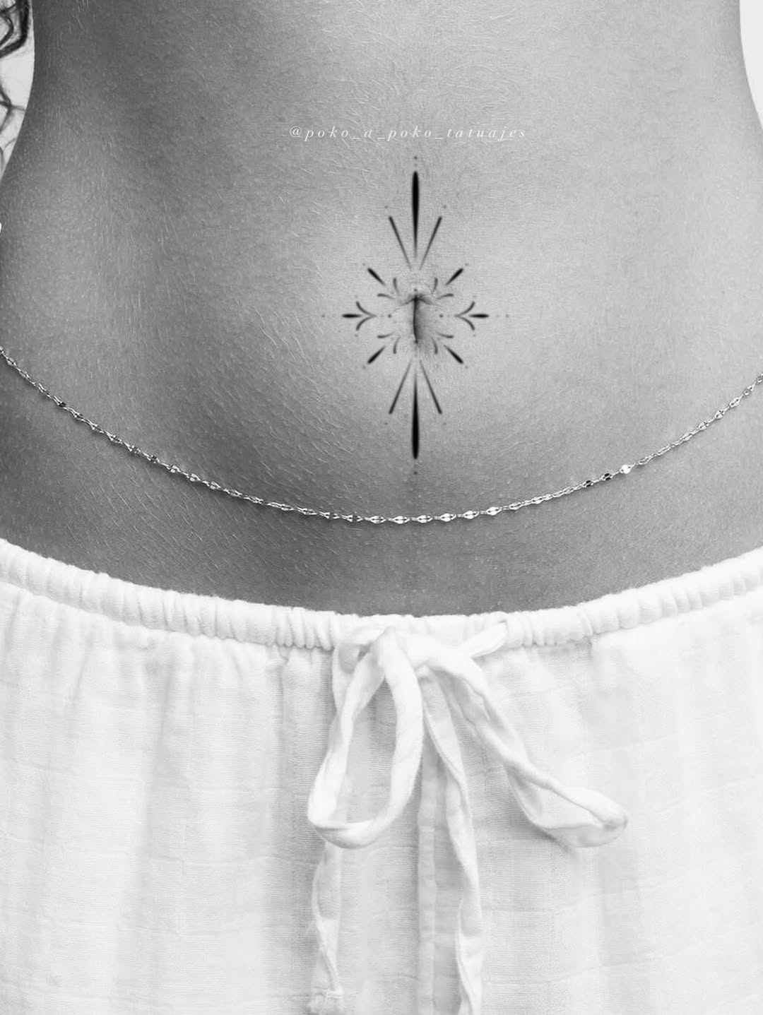 Geometric starburst tattoo on the torso by @ethereal.ornamentalism