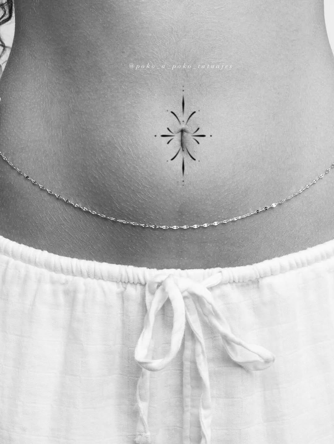 Geometric starburst tattoo on the torso by @ethereal.ornamentalism