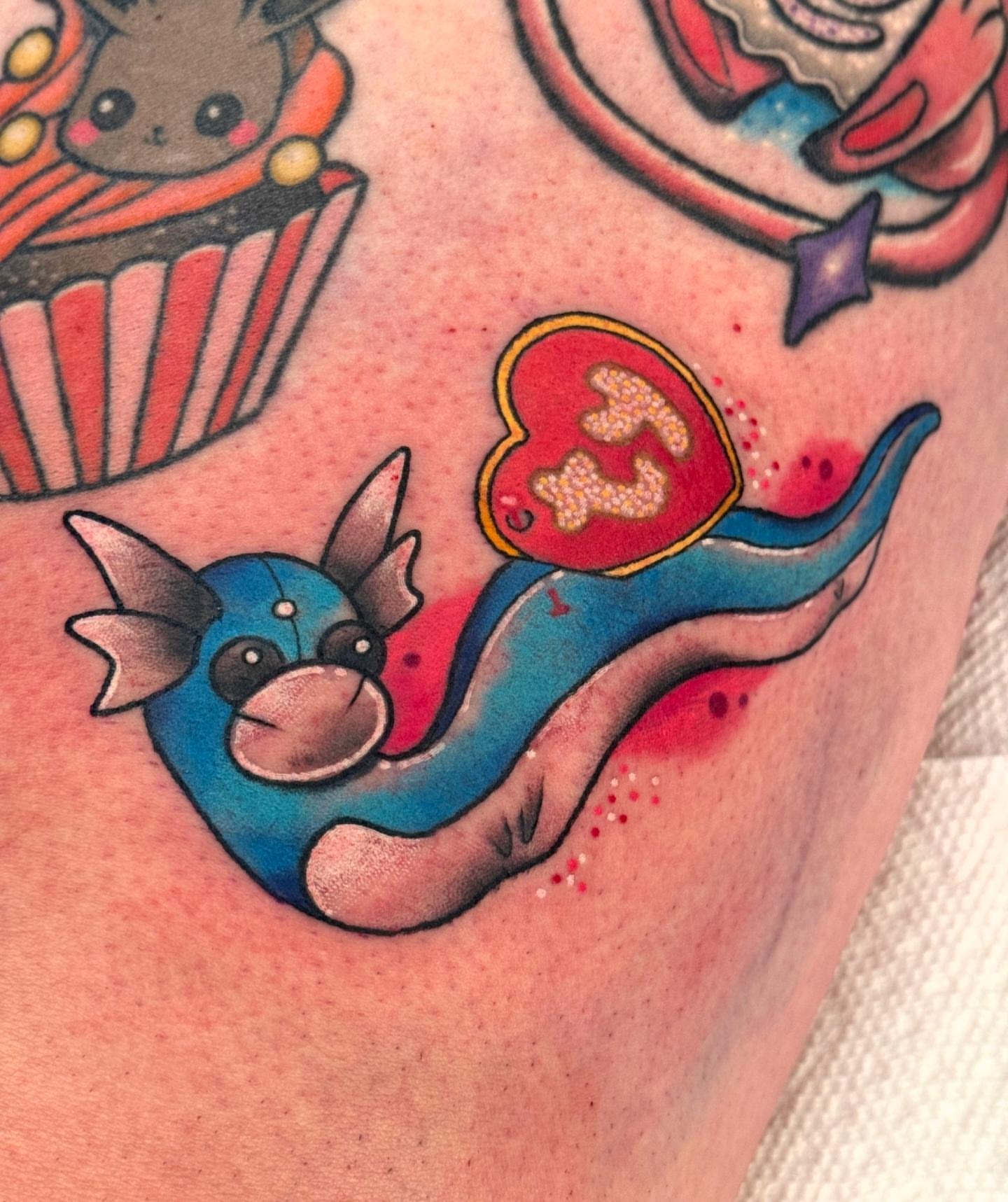 Squirtle new school tattoo on the upper arm by Tattoos by Angel Lee