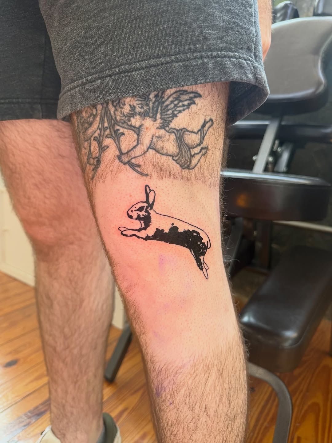 Running rabbit fine line tattoo on the forearm by Jose Javier