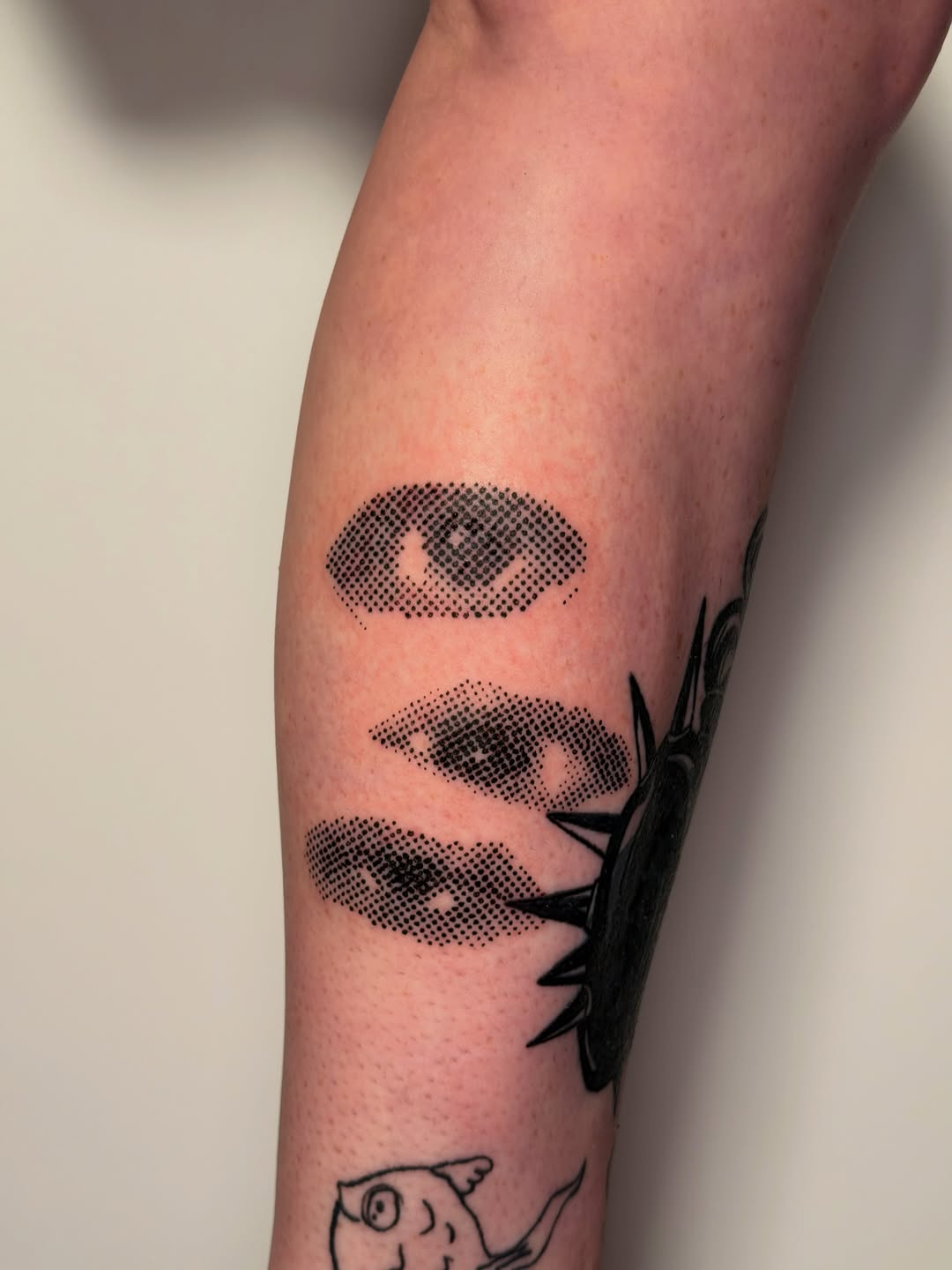 Three eyes dotwork tattoo on the forearm by Alaska