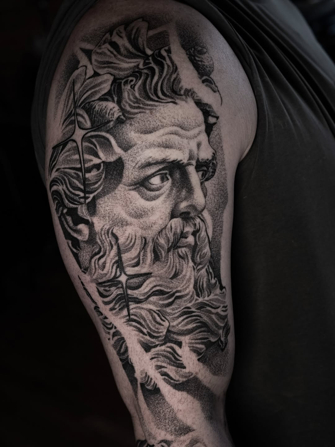 Bust of a man surrealism tattoo on the shoulder by Craig St Peter, Kansas City, Missouri
