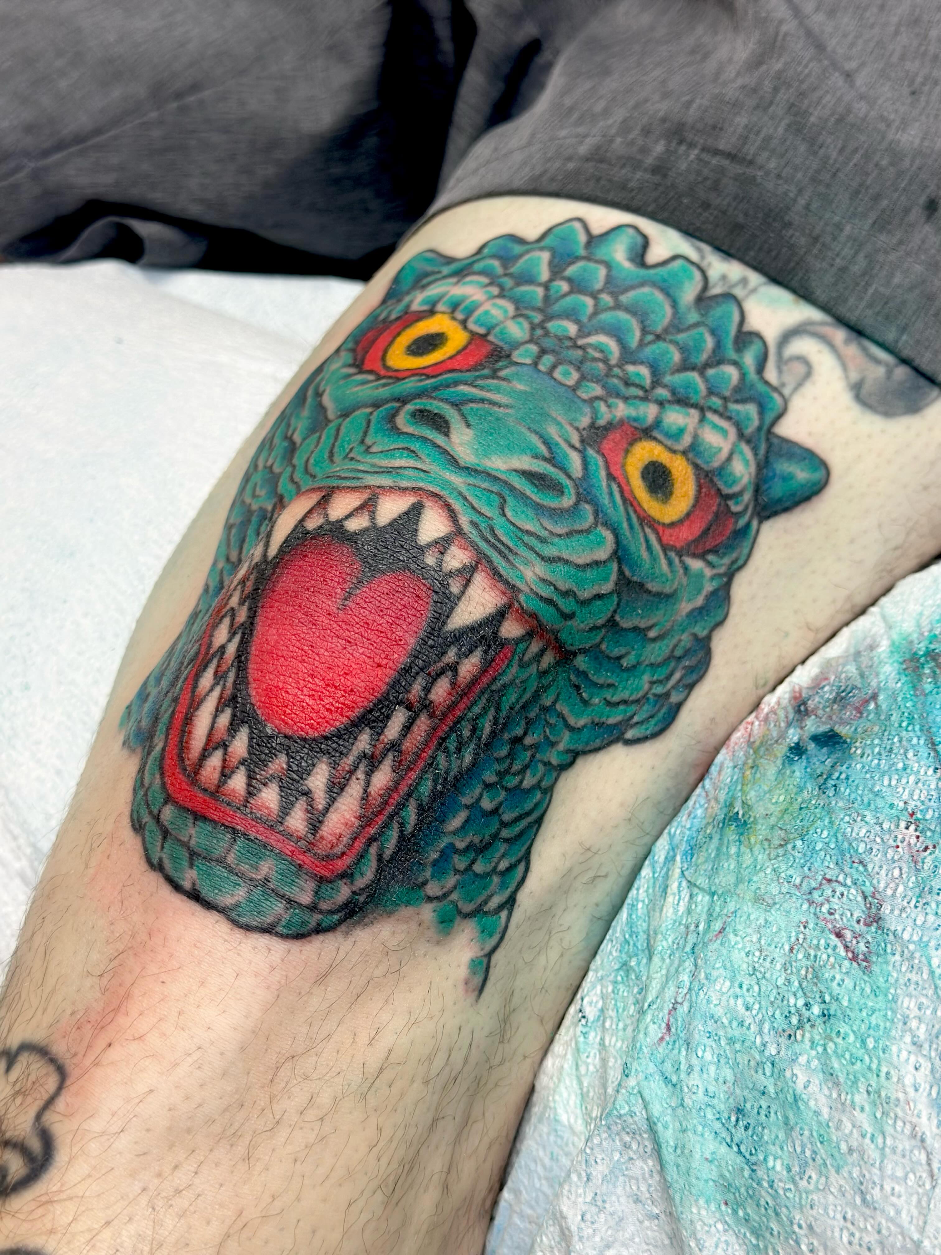 Serpent head American traditional tattoo on the forearm by KevinBetsch